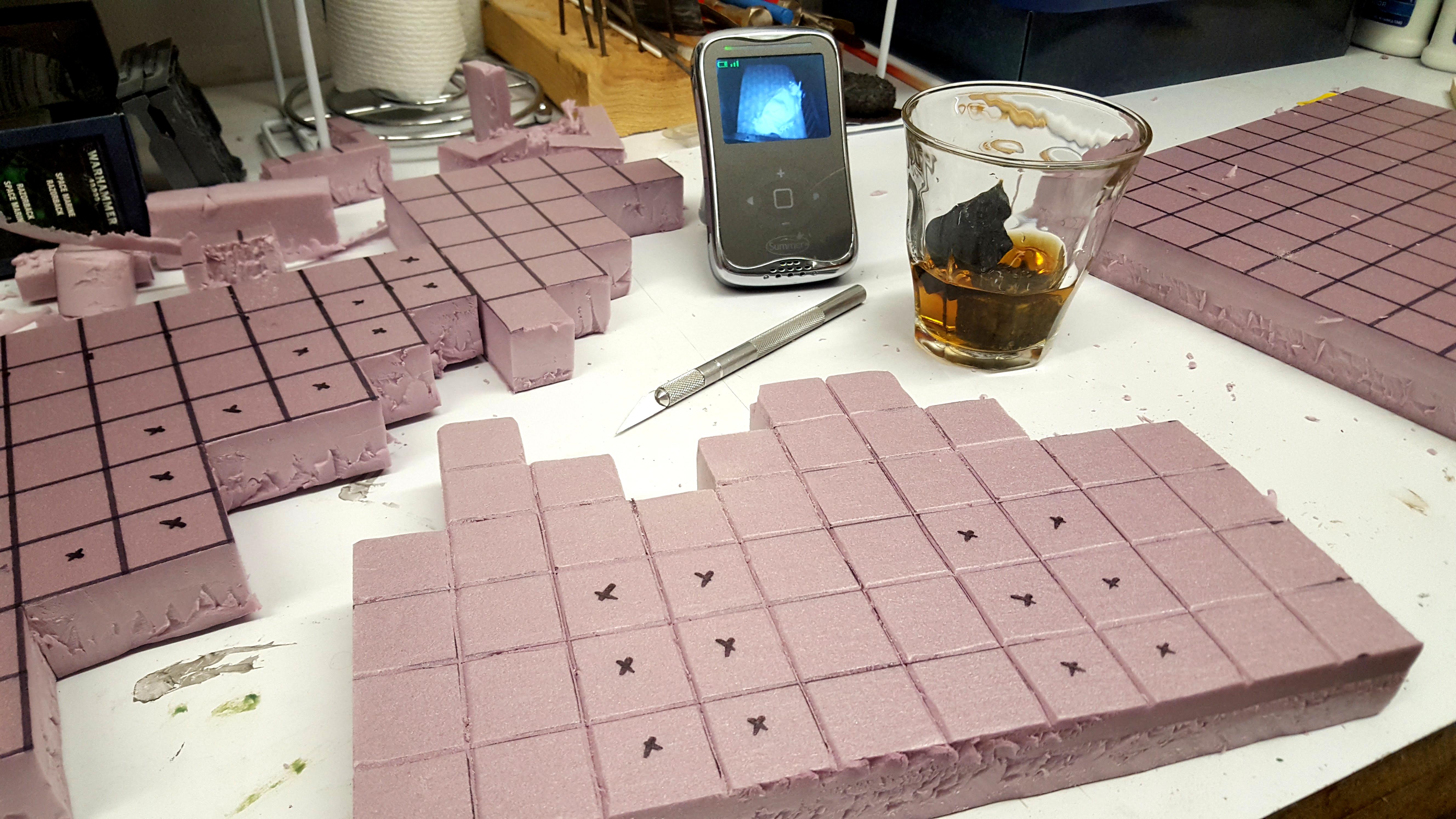 Friday night in the basement: scotch, baby monitor, insulation foam