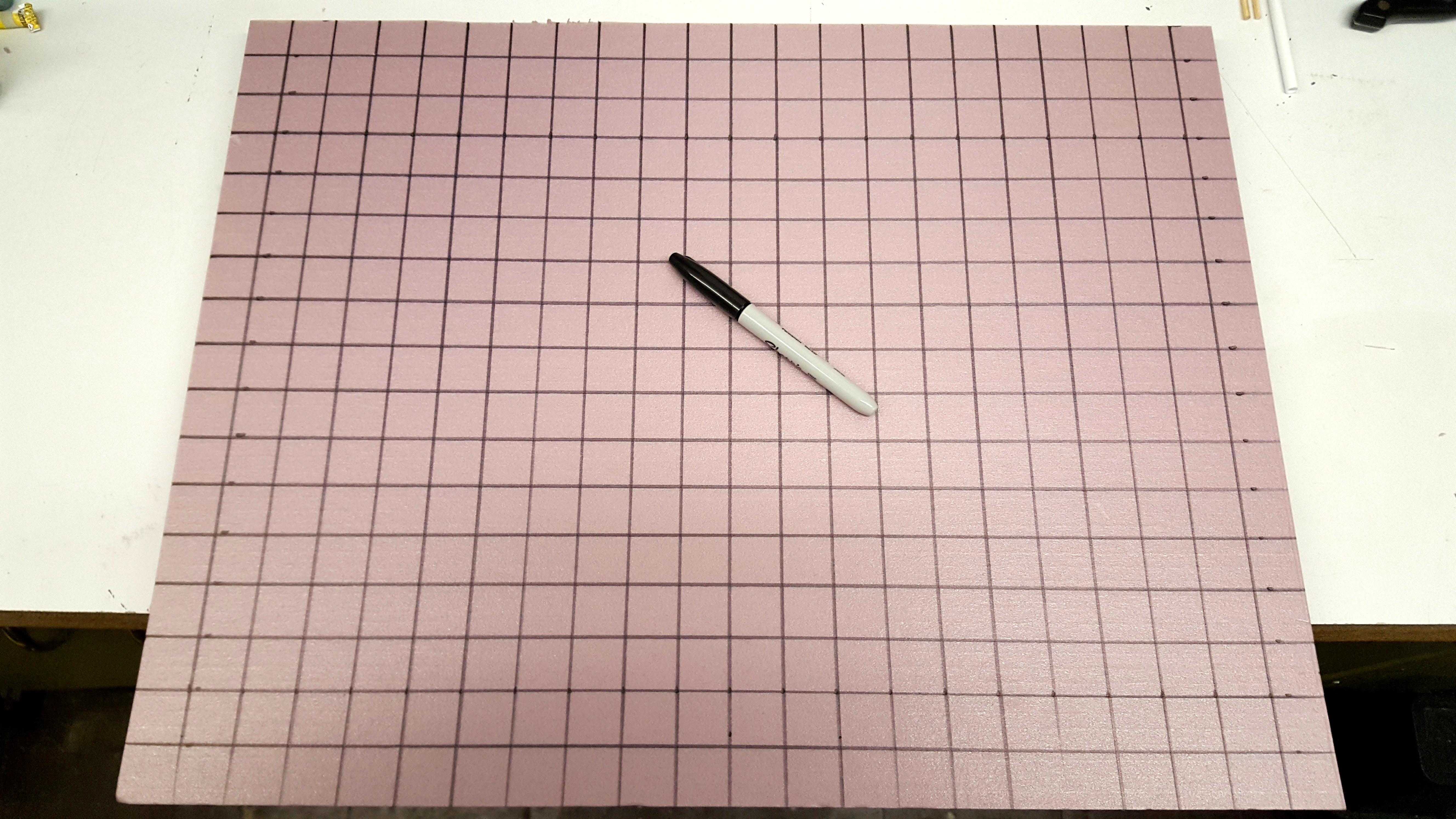 One-inch grid drawn on insulation foam