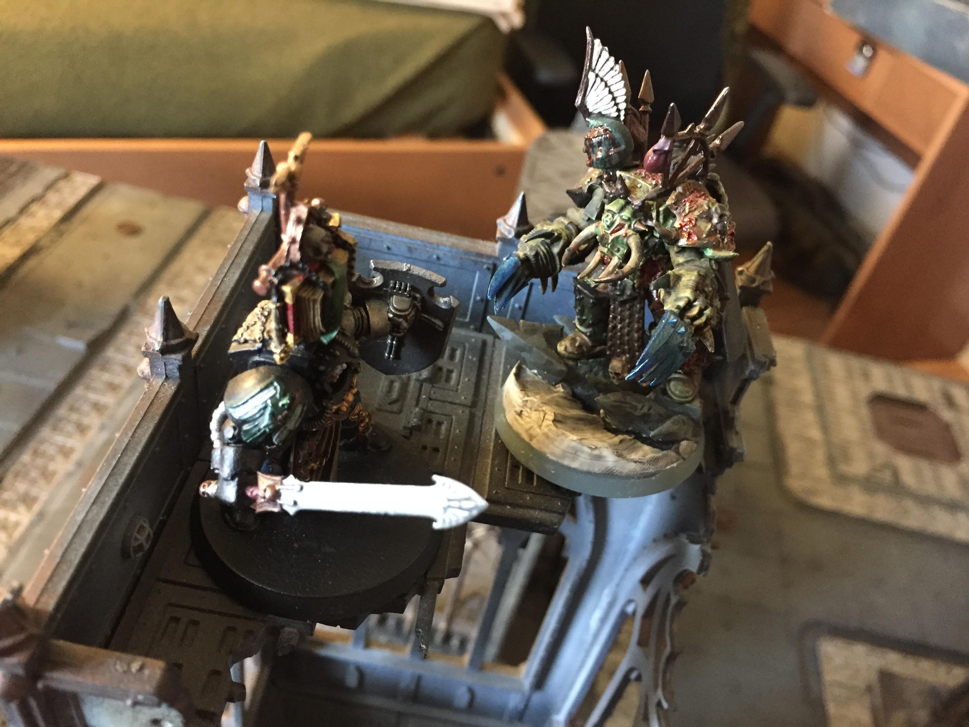 My Deathwatch Liby facing my Nurgle Termy lord.  Nurgle won
