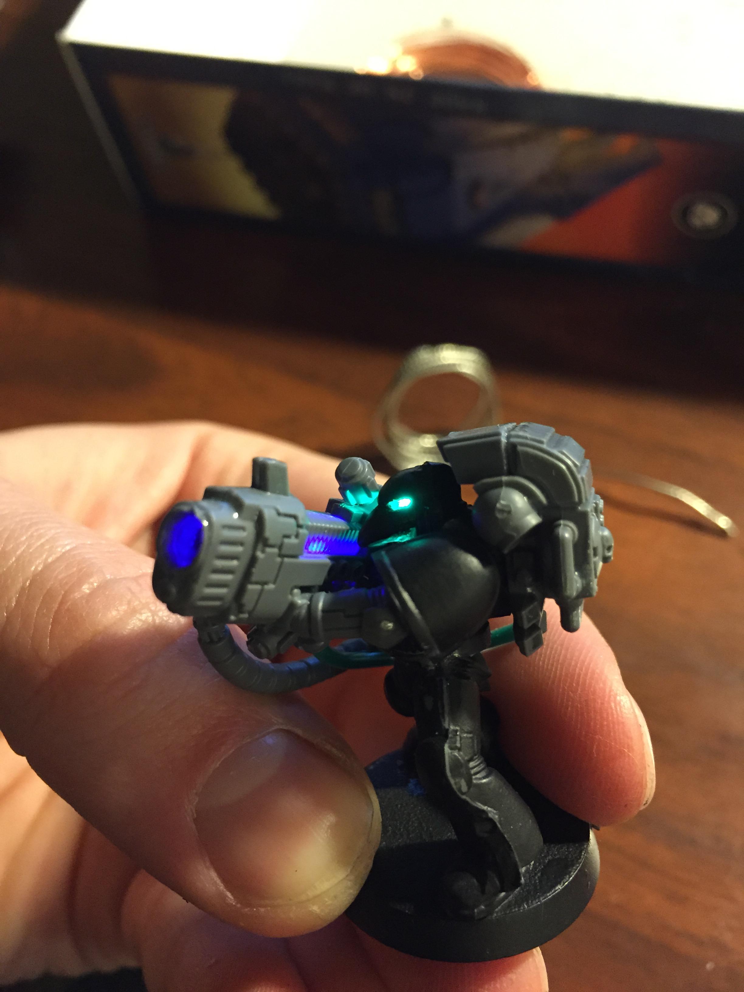 LED head and gun, wires ran through torso, legs, out the base