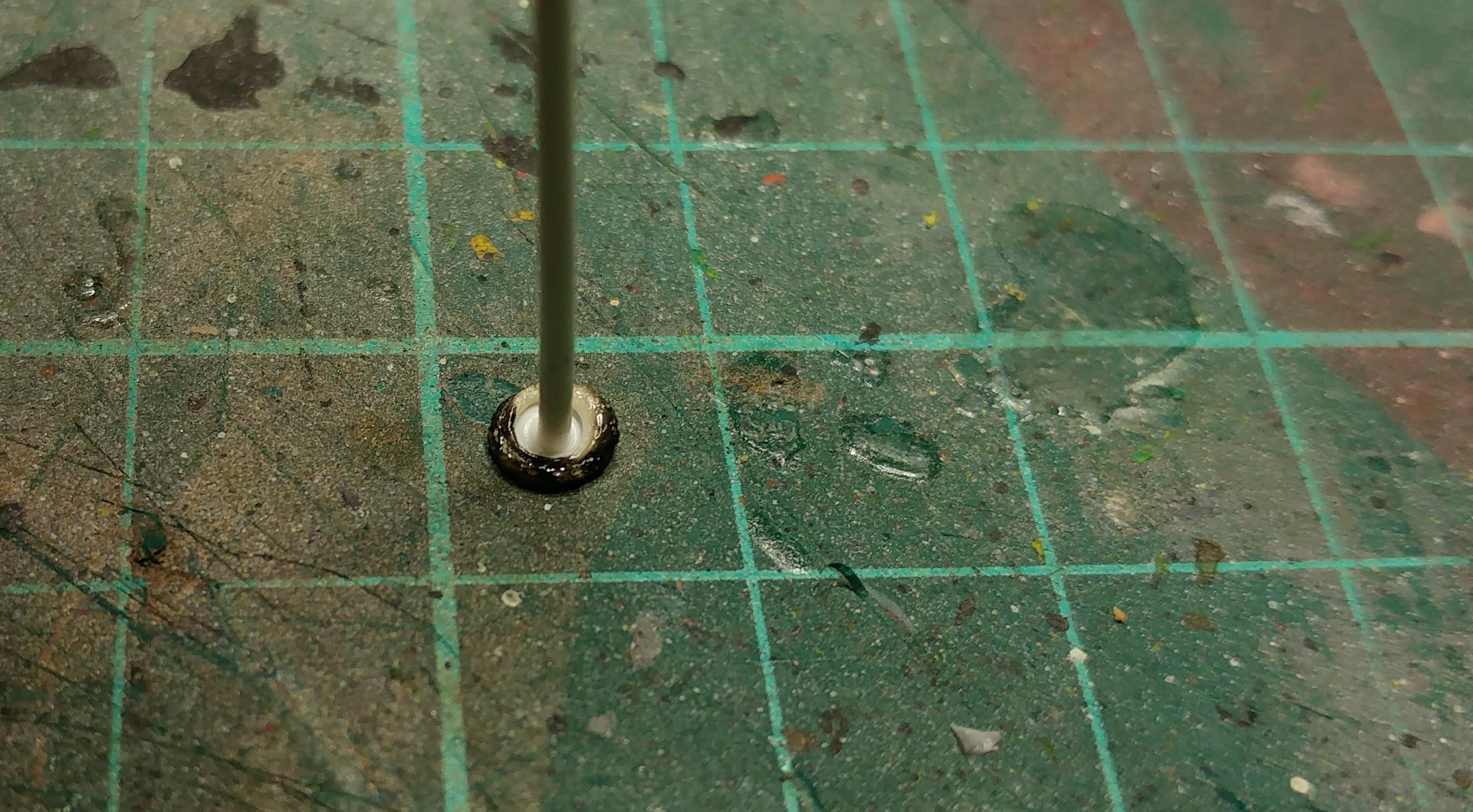 3 - (1mm) press the melted end onto a smooth surface