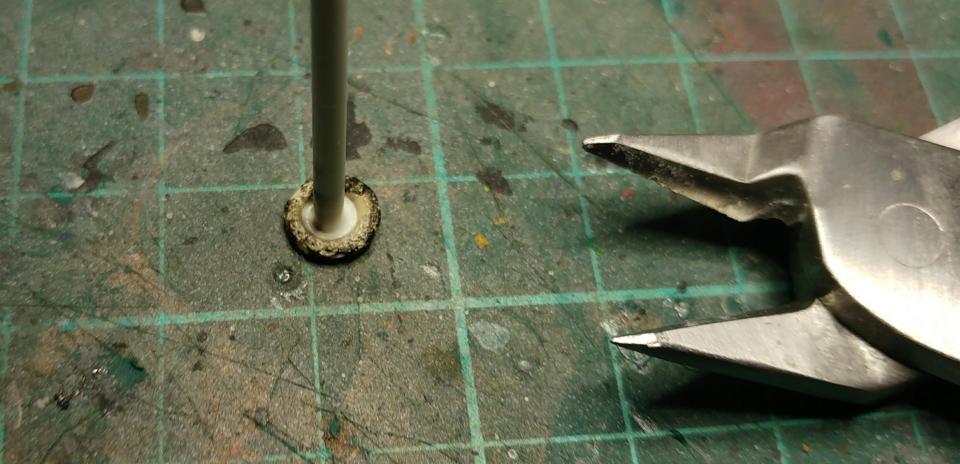 3 - (2mm) press the melted end onto a smooth surface