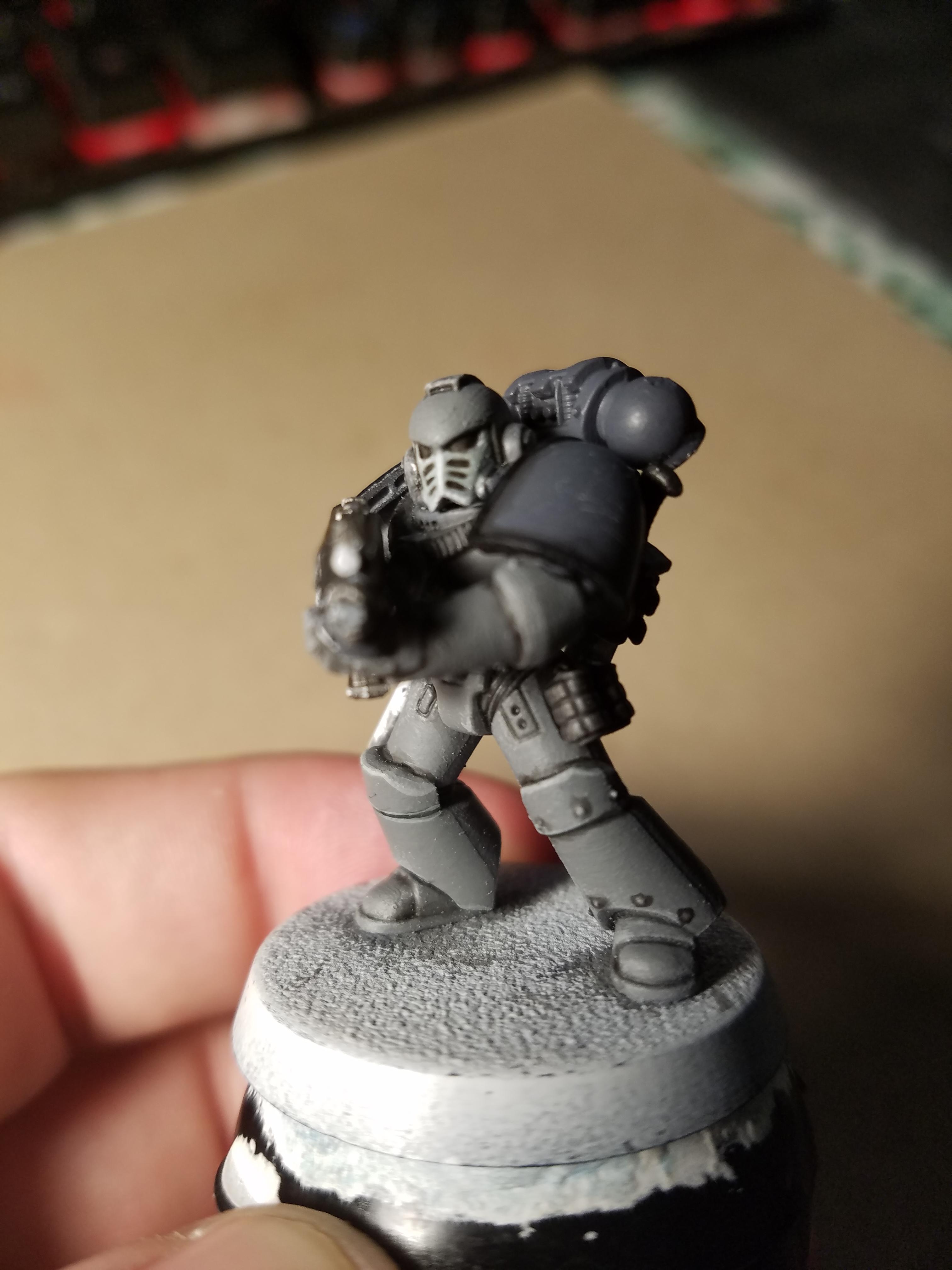 The one semi-finished Marine I have, Bolter, CCW/Pistol strapped on, Grenades, and before Varnish