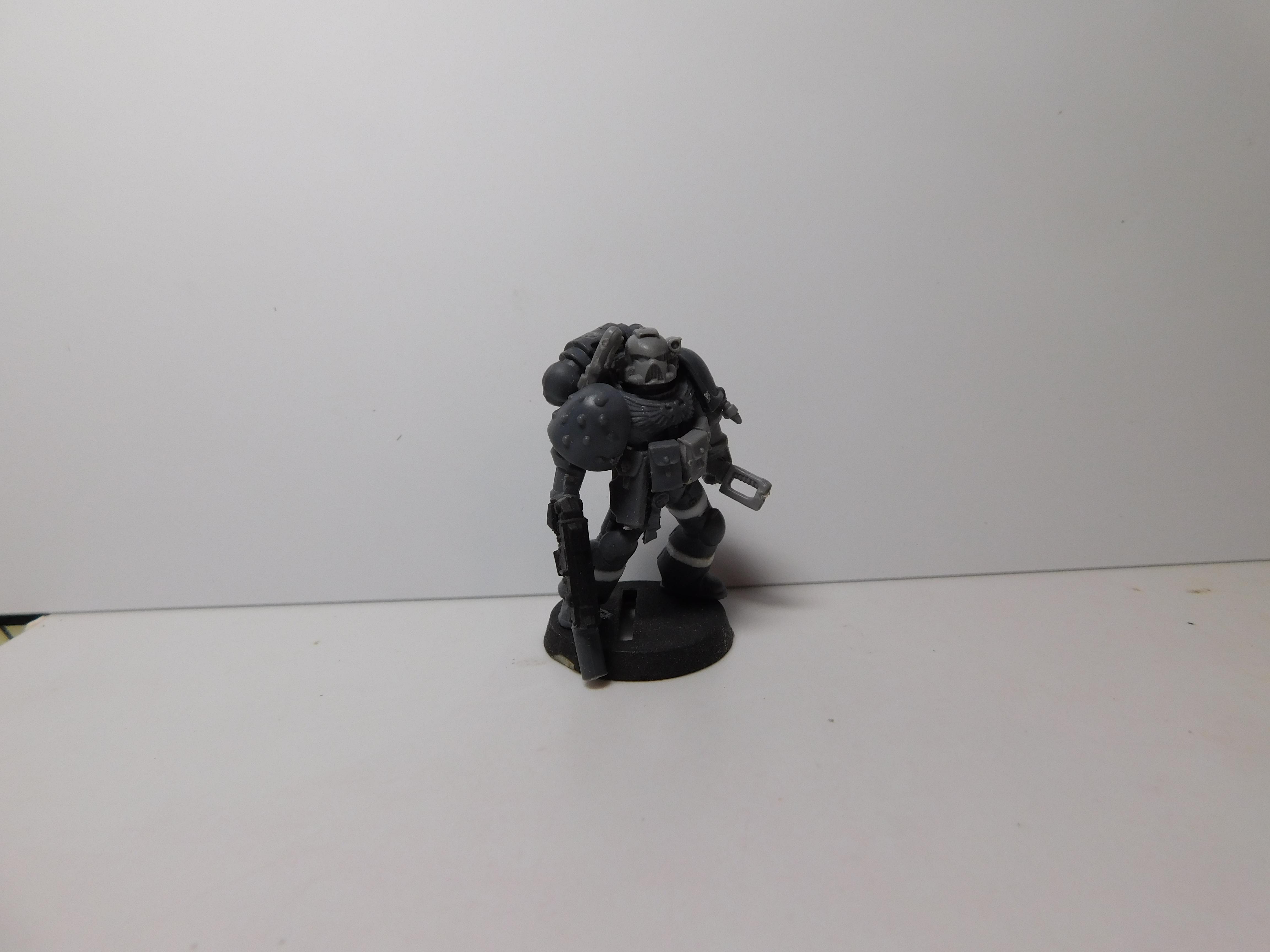 This Marine has a Marksmanship Award attached to his left pauldron for single handedly dispatching a Nob squad during his serving as a Sniper in the Scout Company. 