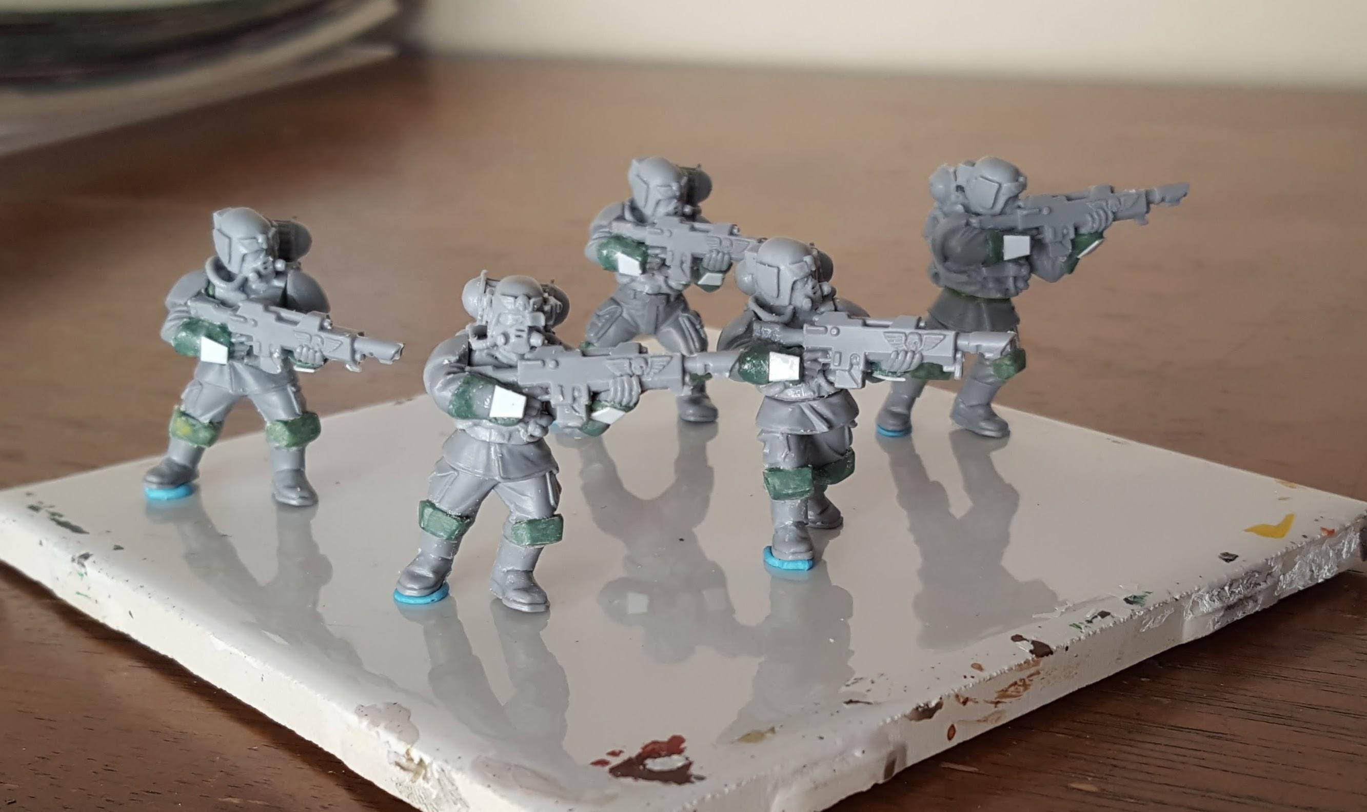 Forge World &quot;Hostile Environment&quot; plasma troopers with Green Stuff kneepads, Green Stuff and styrene card armored gloves