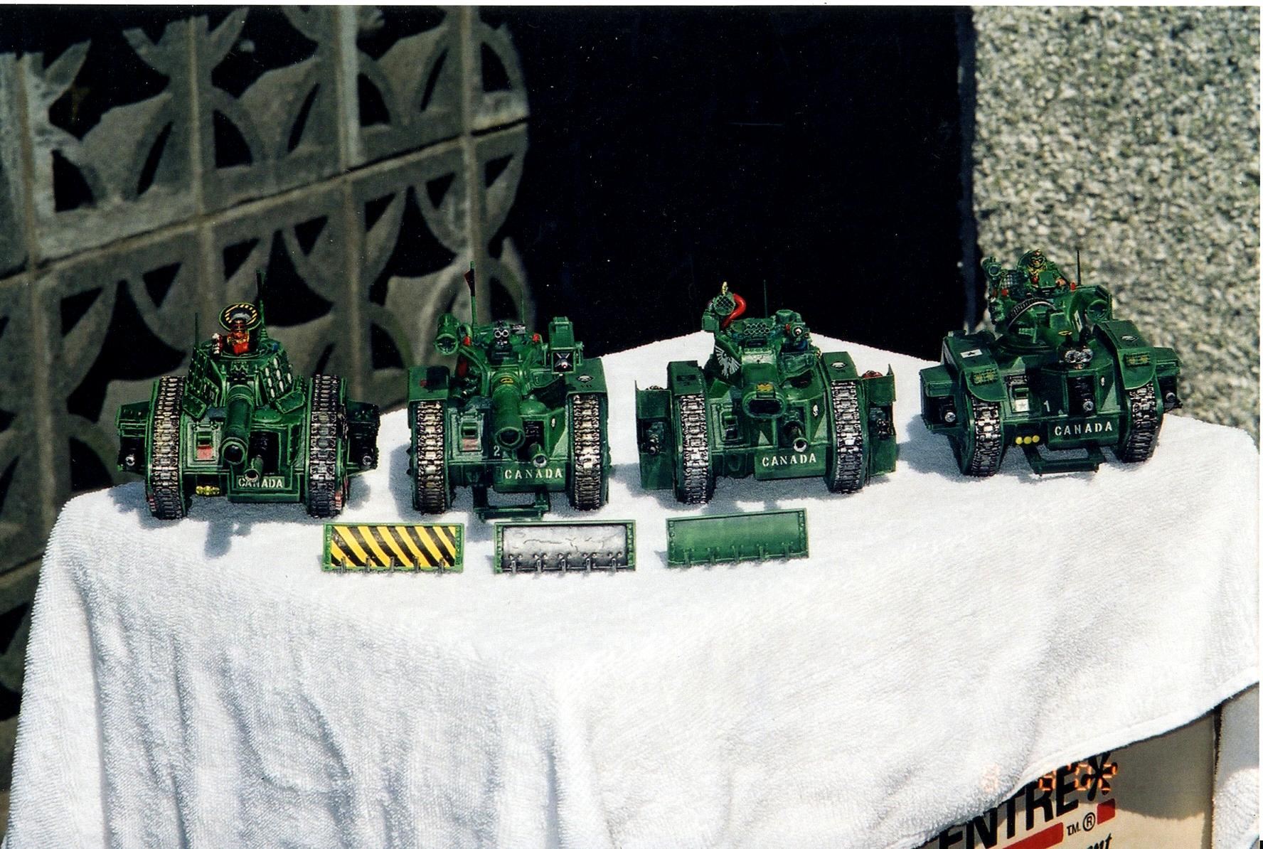 Four (4) Leman Russ tanks and dozer blades