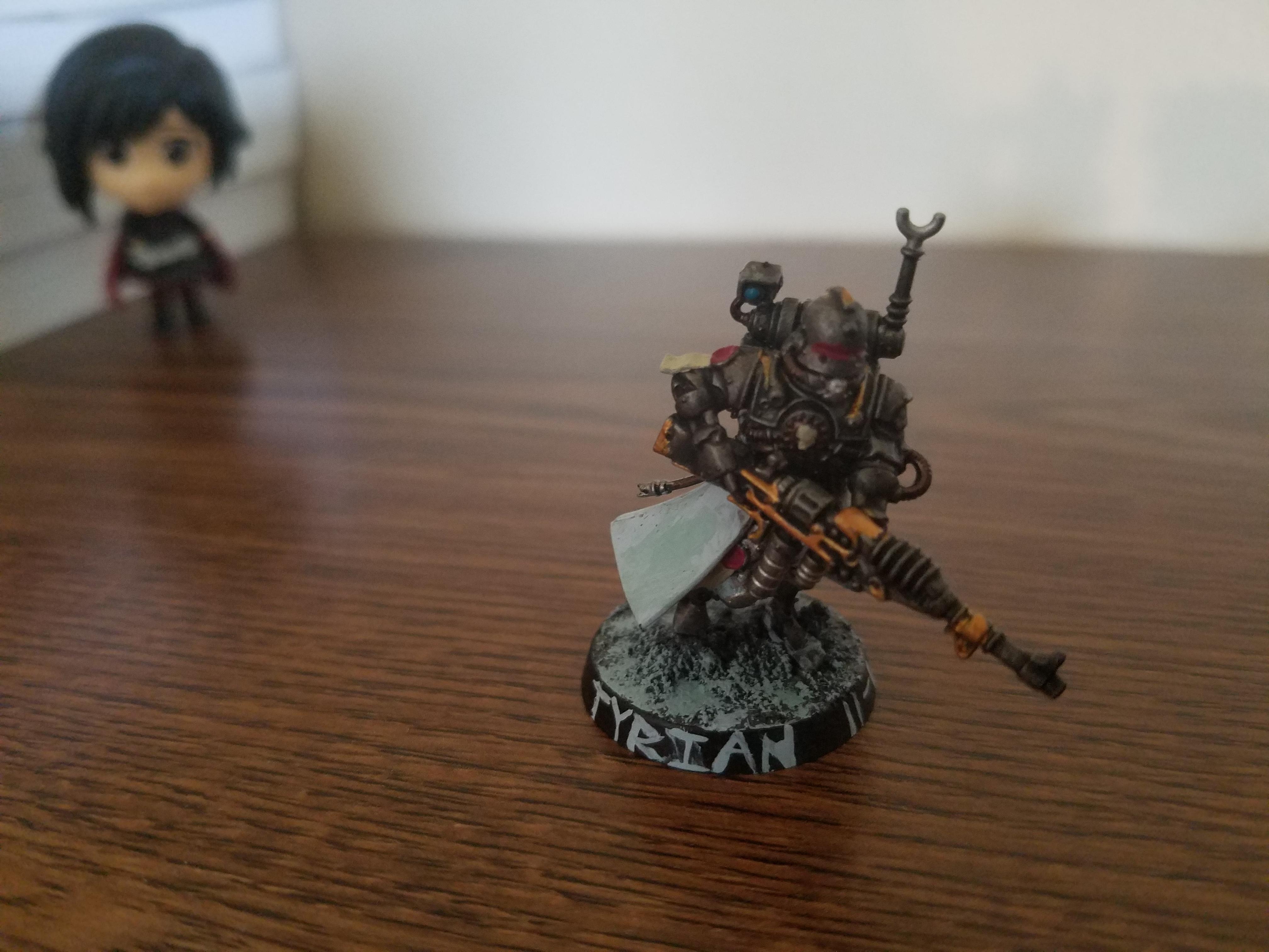 This here is Tyrian 2-6. Tyrian 2-6 here ended up losing his entire squad in a 3,000pt match against Guardsmen by turn 3. He not only survived until turn 7, but managed to hold an objective, kill about 10 guardsmen, and cause a few more to run
