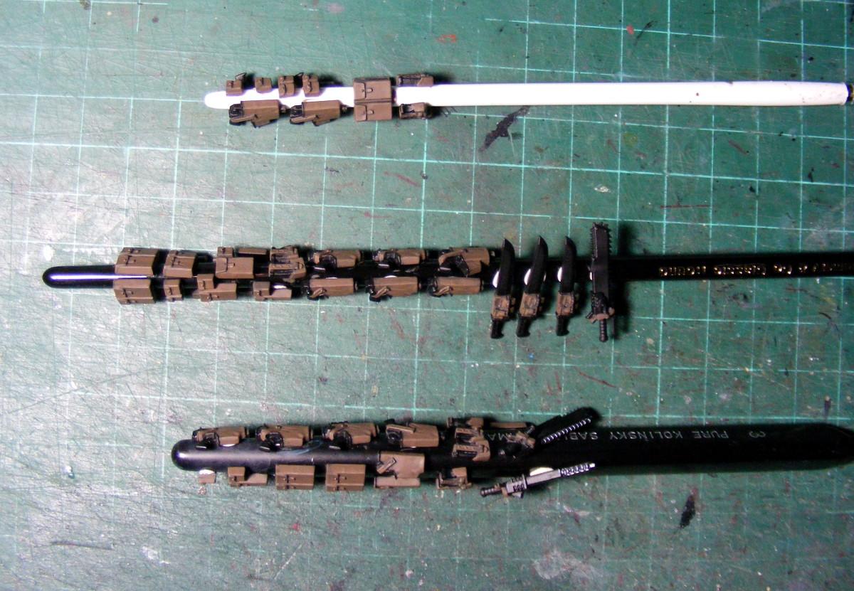 pouches 'n' stuff on, a stick