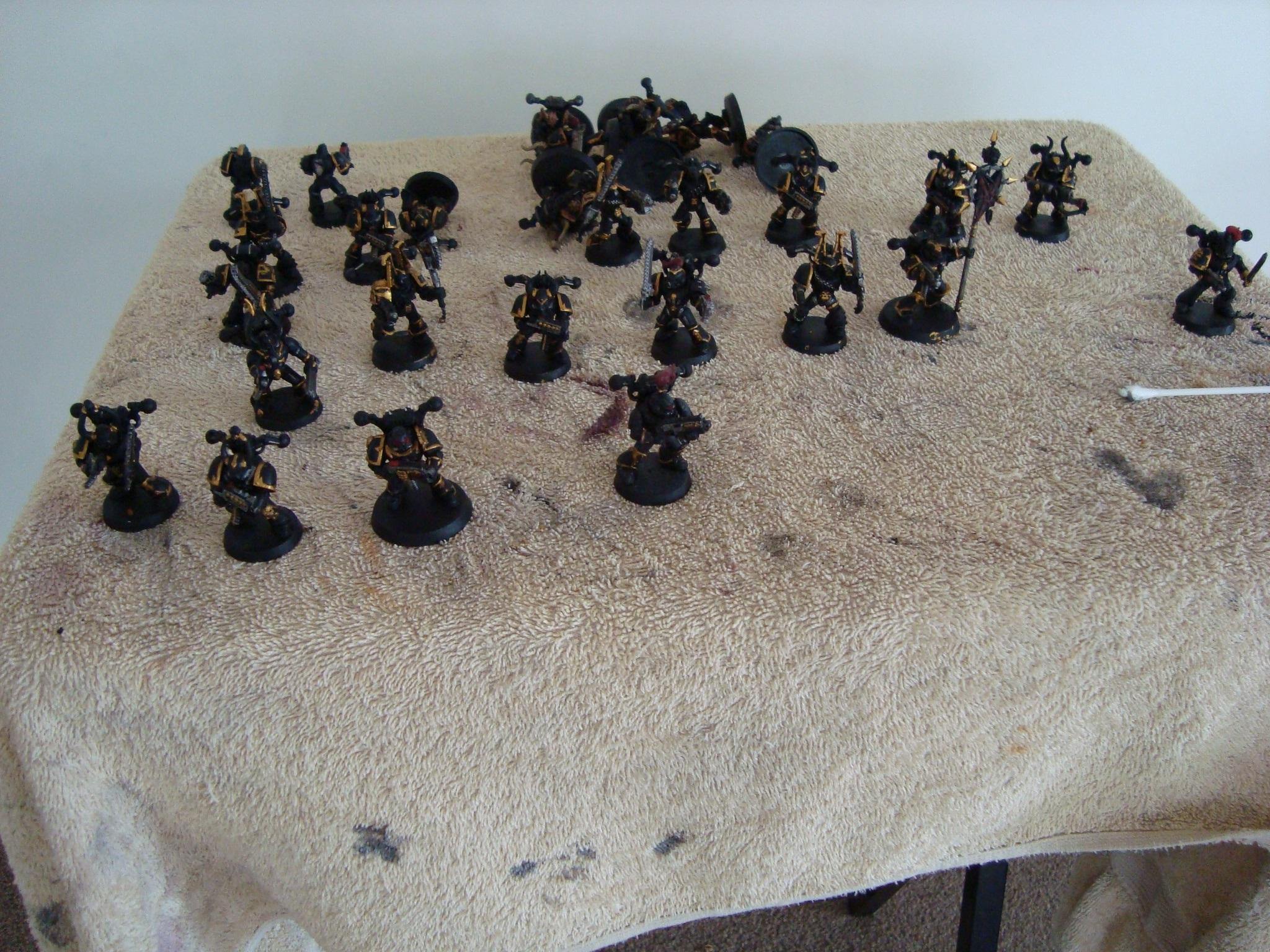 Also heres the troops, basicly finished wash/base restore and 1st stage highlights of gold and steel, still need to get bone colored paint, but i am doing 2nd highlights next, then restoring black areas etc etc