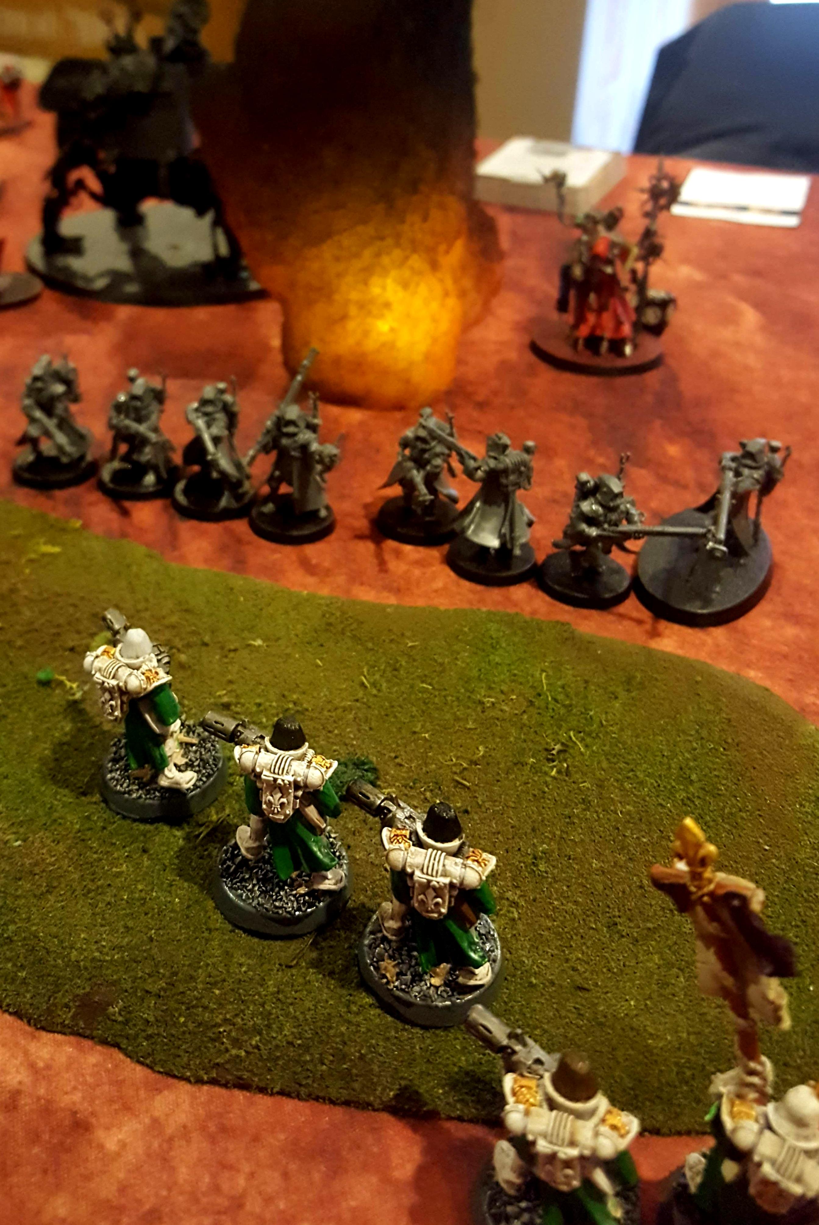 Melta-toting Dominions take out an Onager Dunecrawler despite its screen of Rangers