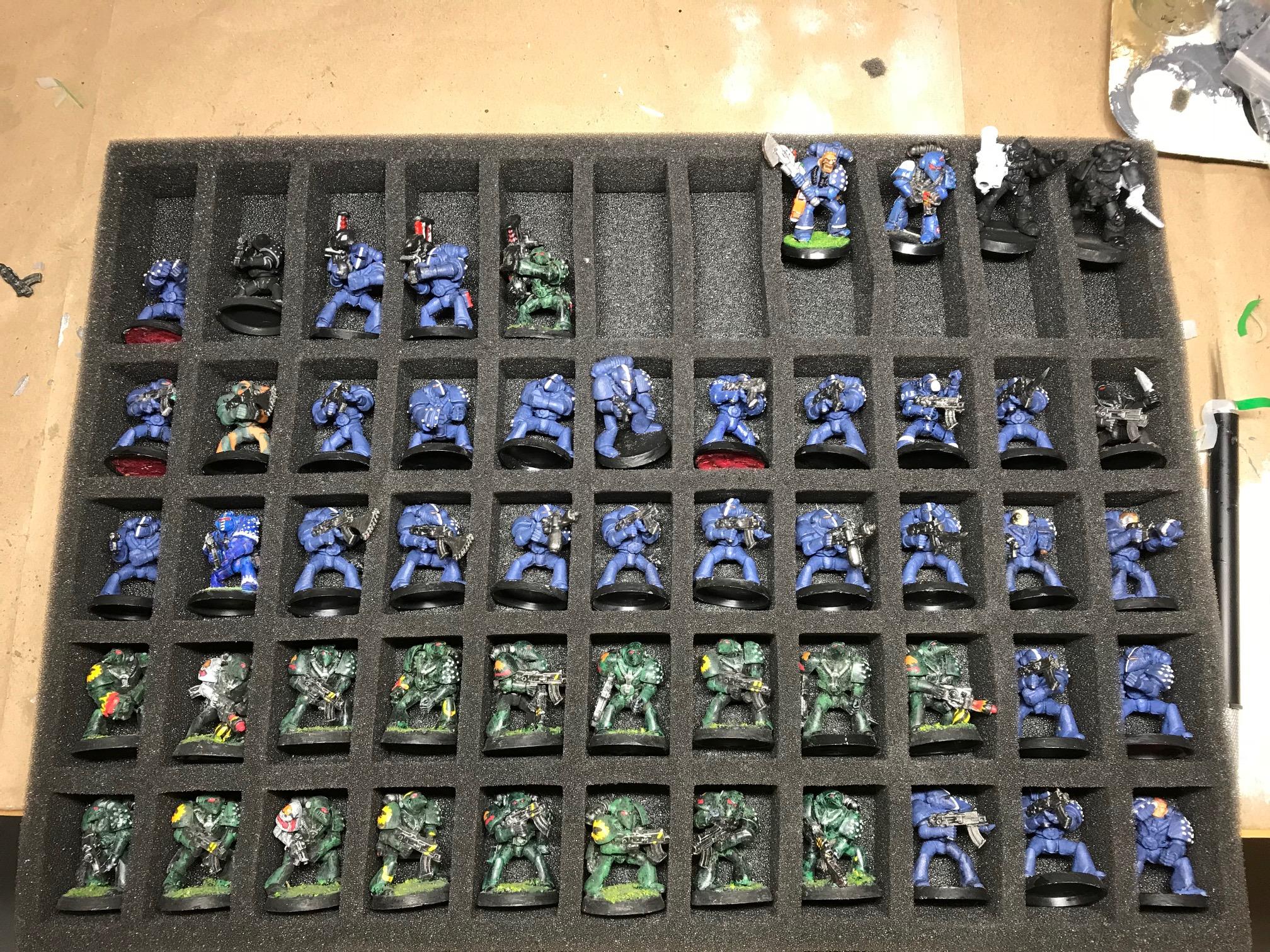 Beaky plastic space marines (4 metal in upper right)