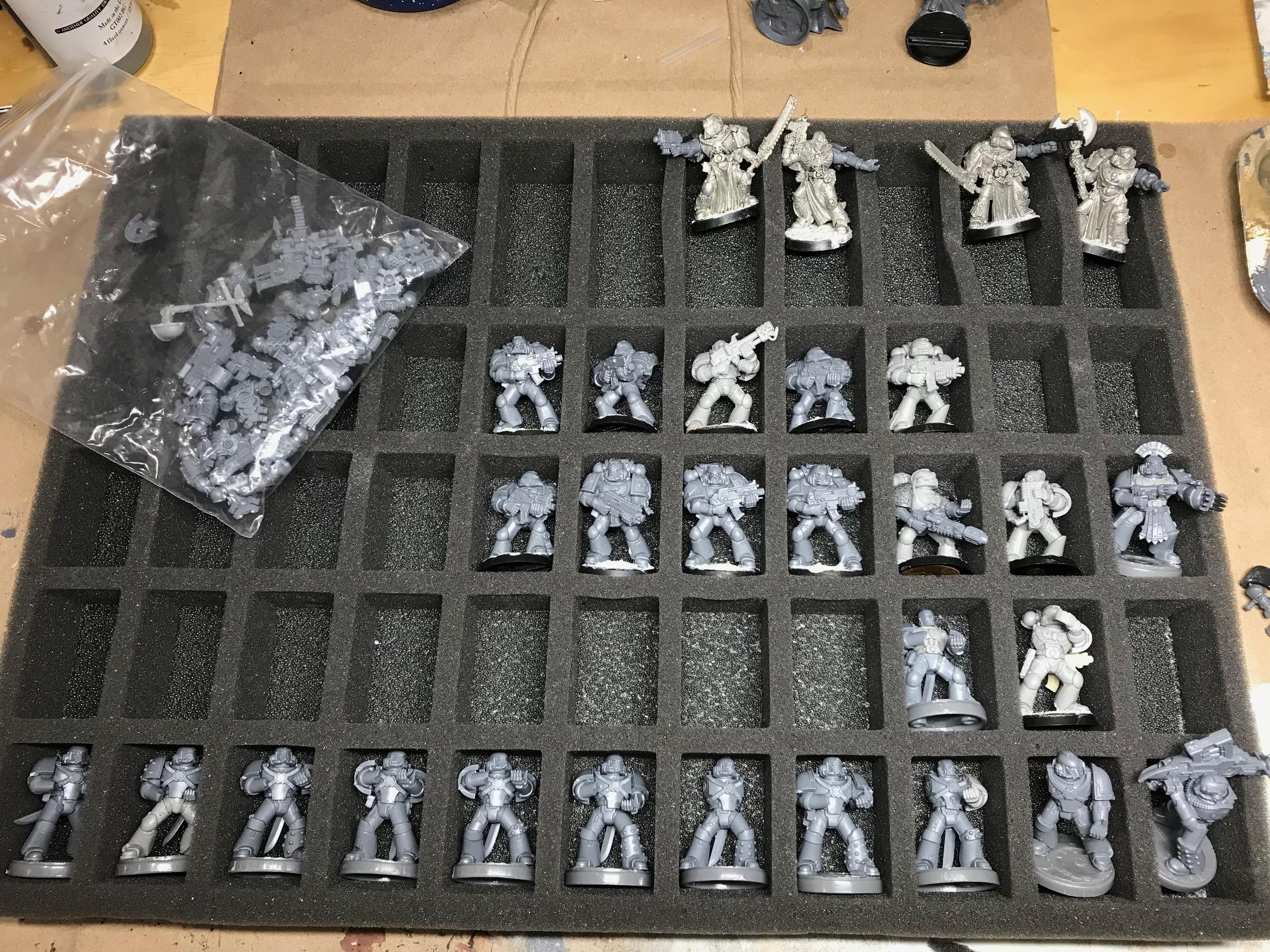 plastic space marines, including Calth 30K and metal in upper row