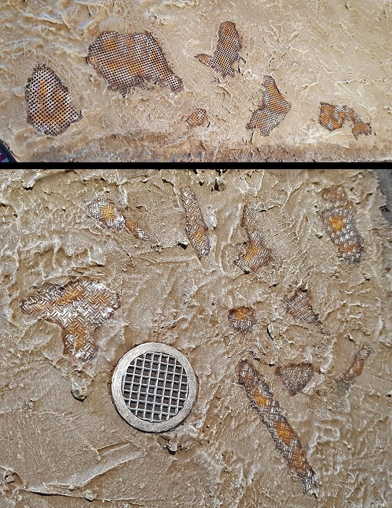 Metal plates after silver is streaked on them