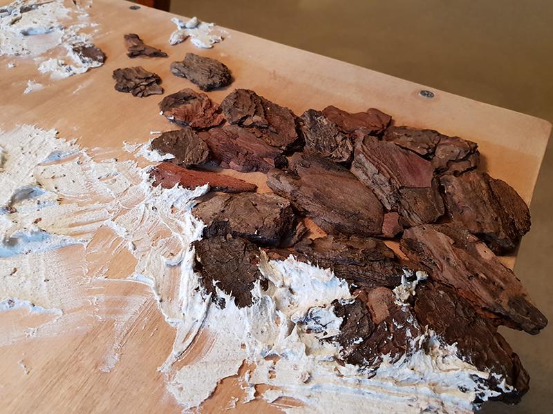 Wood chips for rock outcropping
