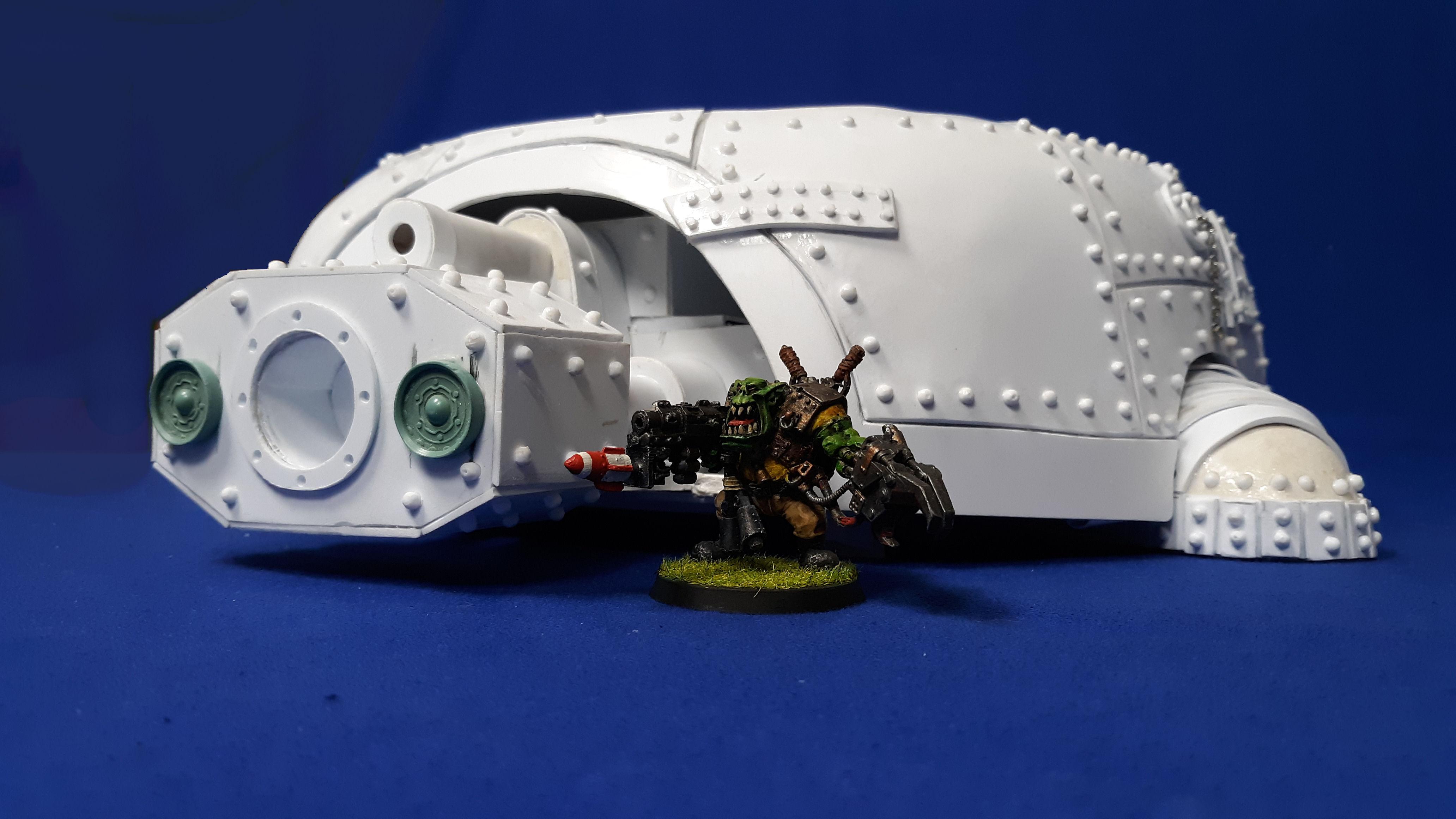 Bull Gunta Grimm Smakk standing next to his Great Gargant's bottom tier. 