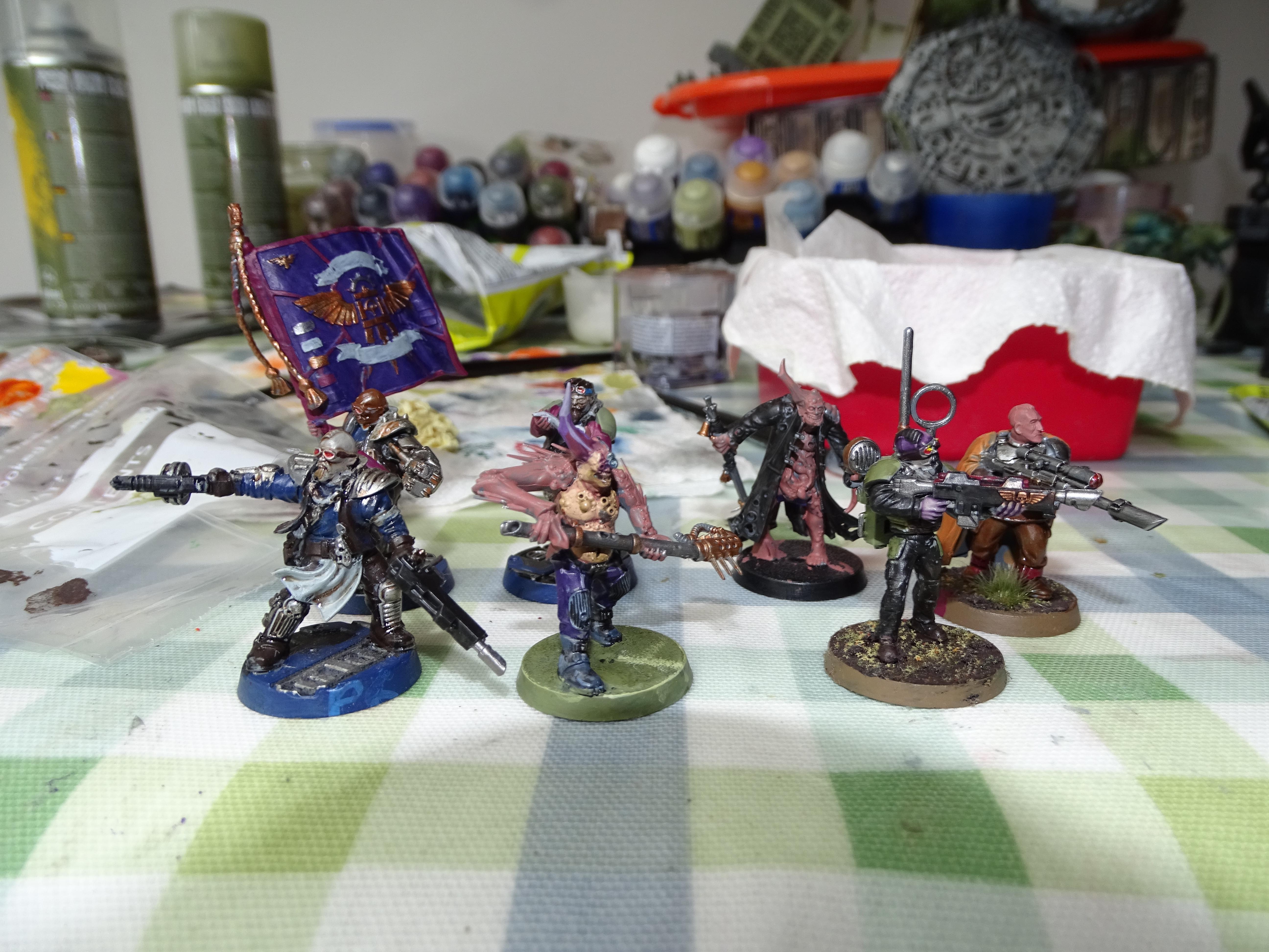 Group of guardsmen and a poxwalker