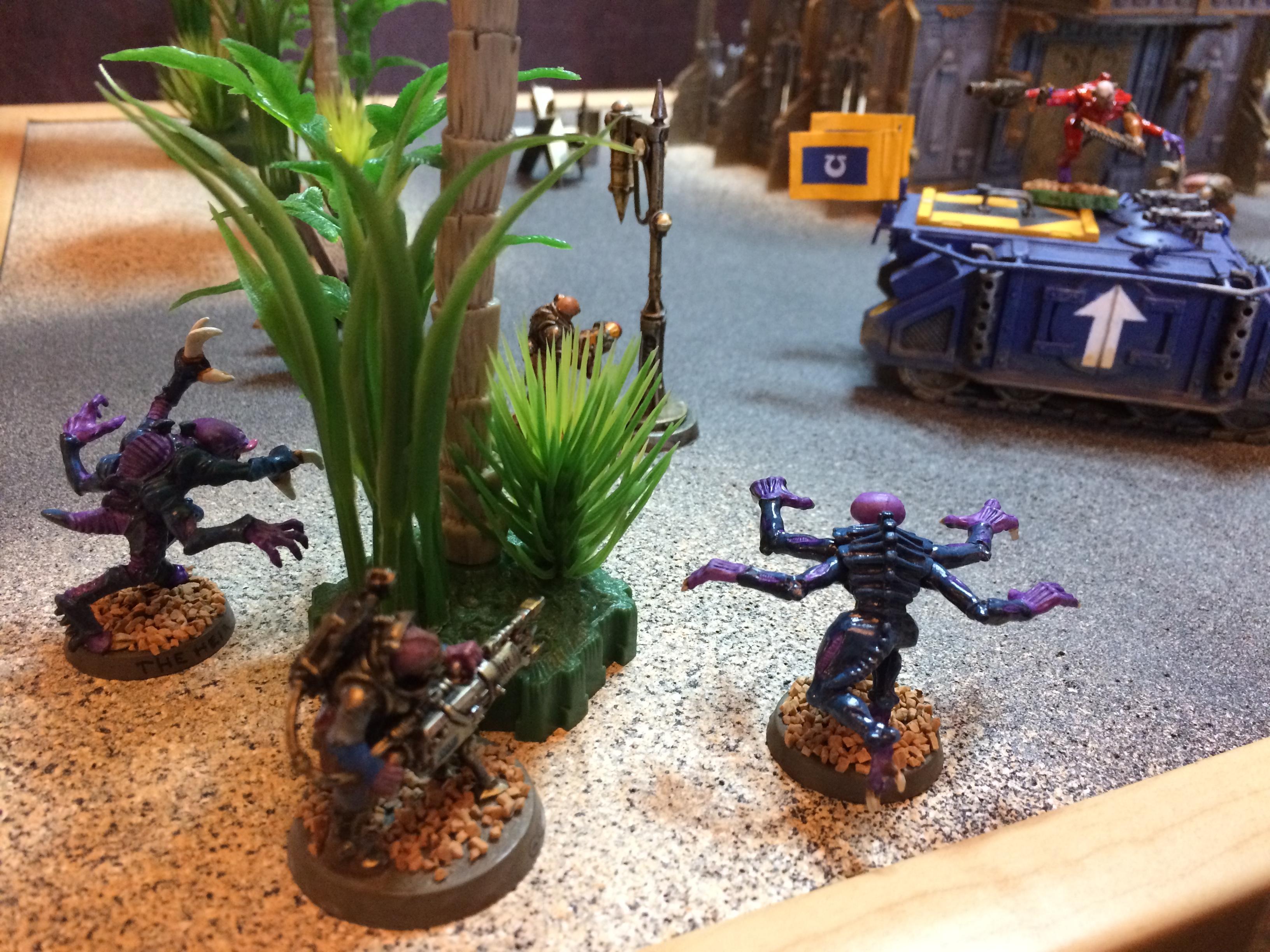 Genestealers behind tree