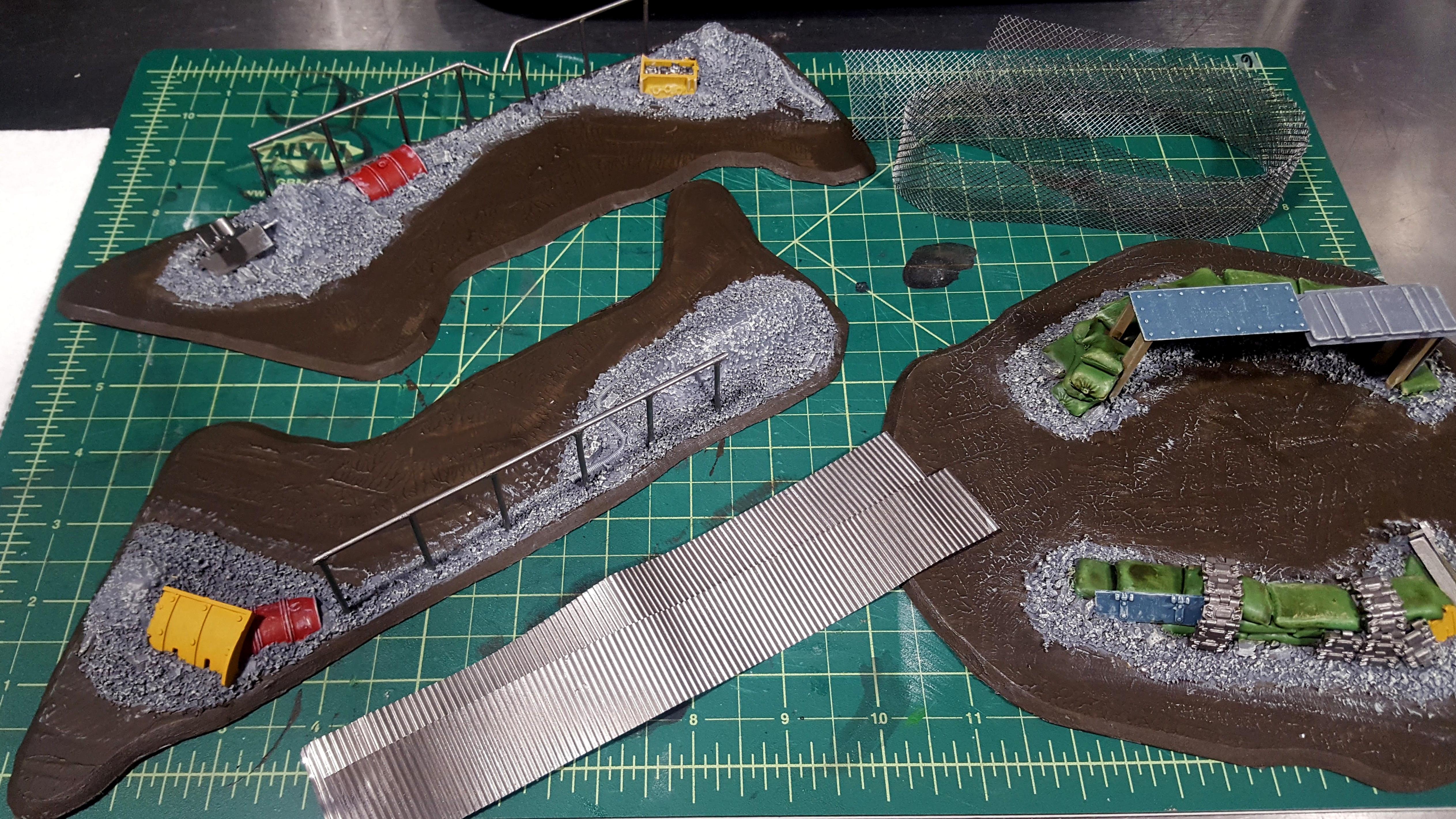 Base colors down and a little drybrushing work, enough to see what's taking shape