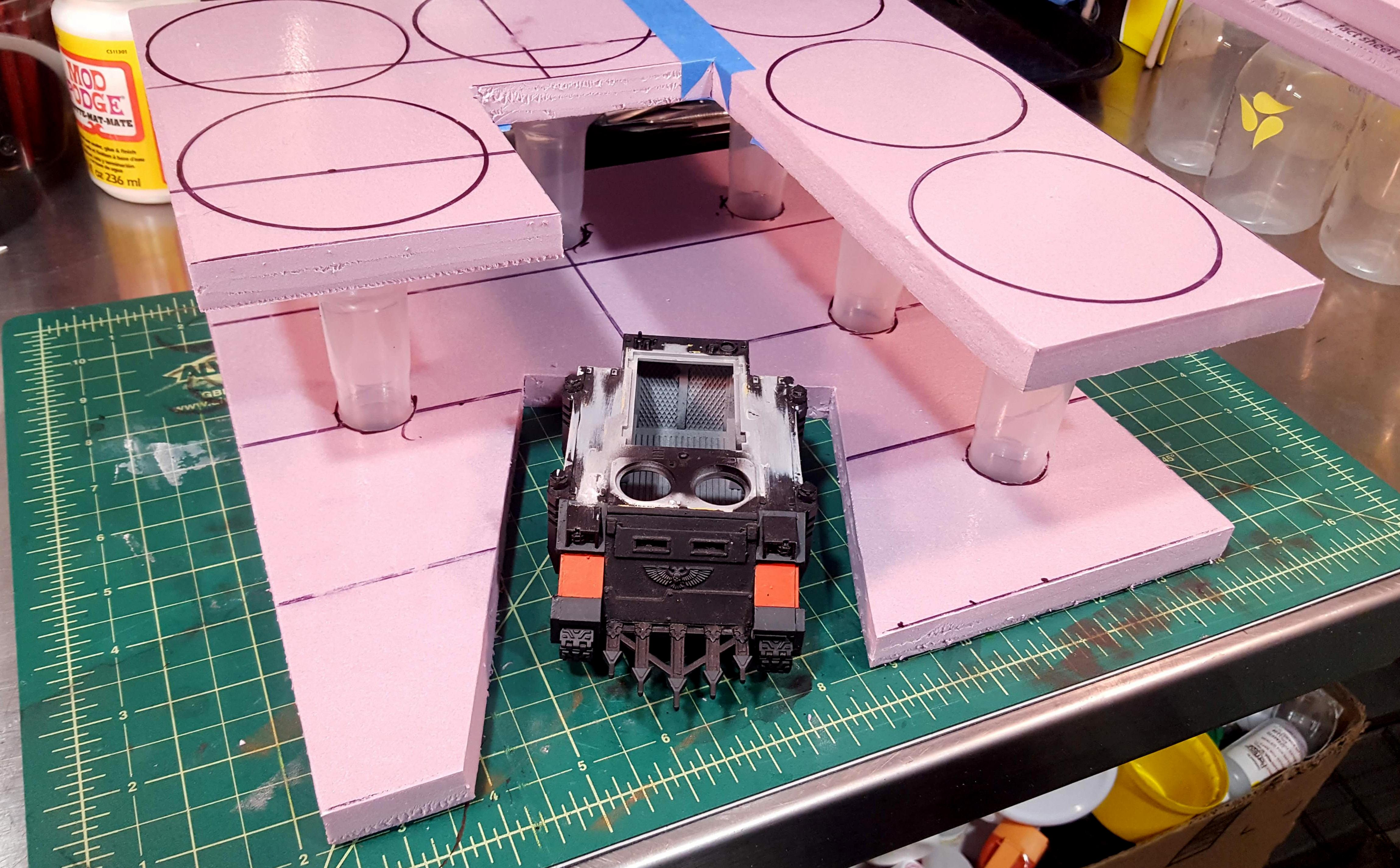 Center section, waiting on a ramp for the cutout vehicle bay
