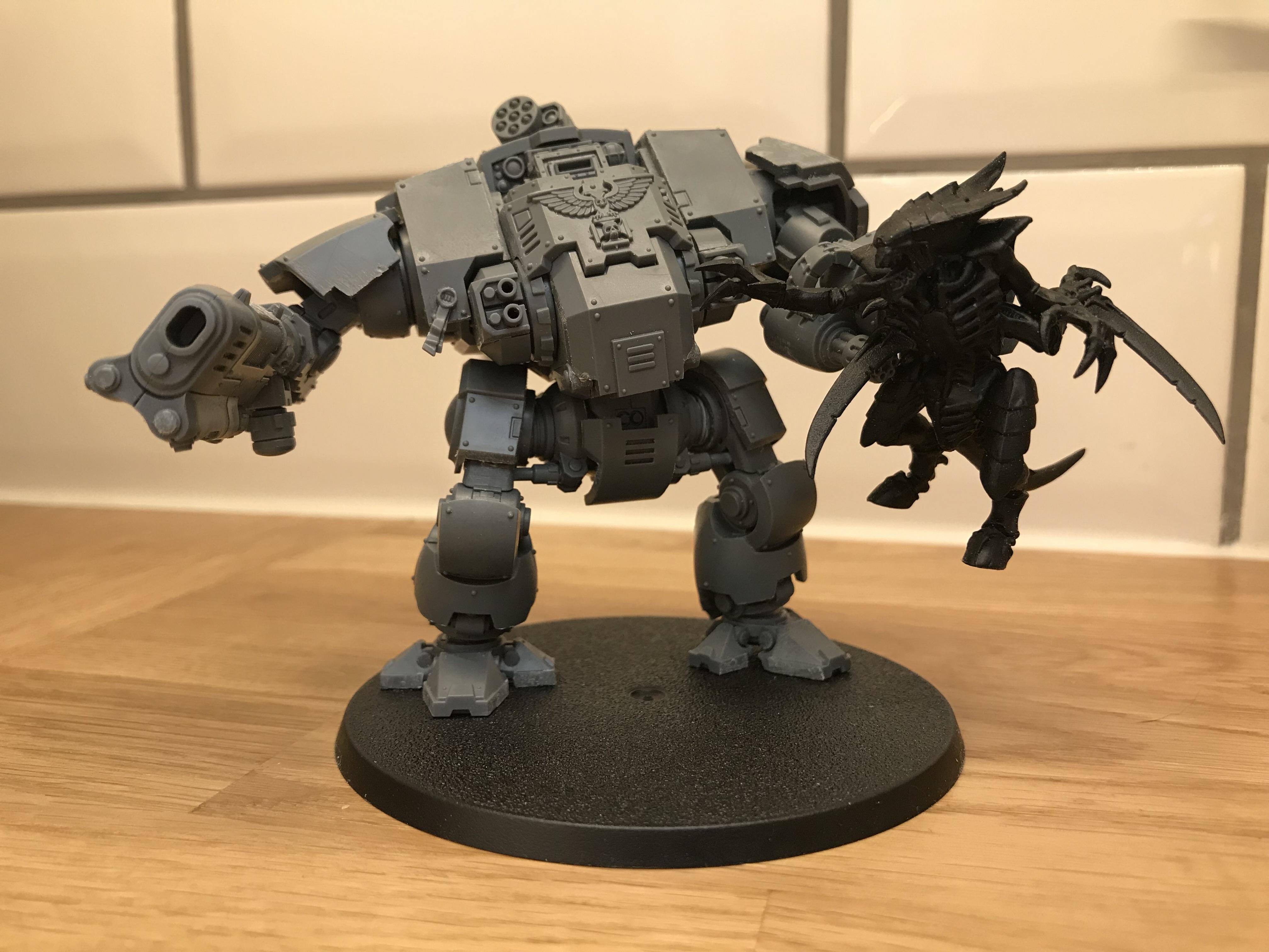 unpainted Redemptor and Tyranid Warrior - front