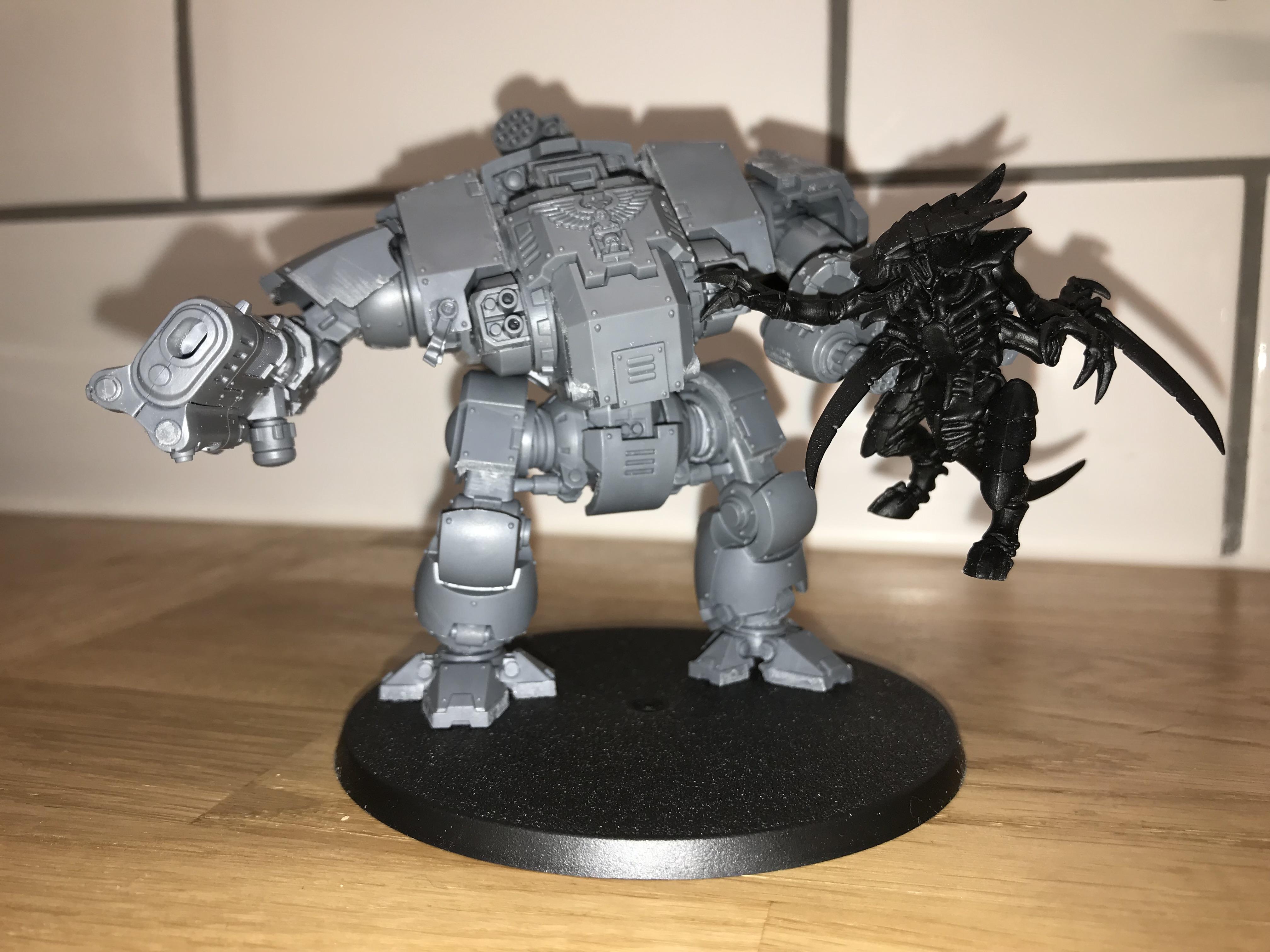 unpainted Redemptor and Tyranid Warrior (with flash) - front
