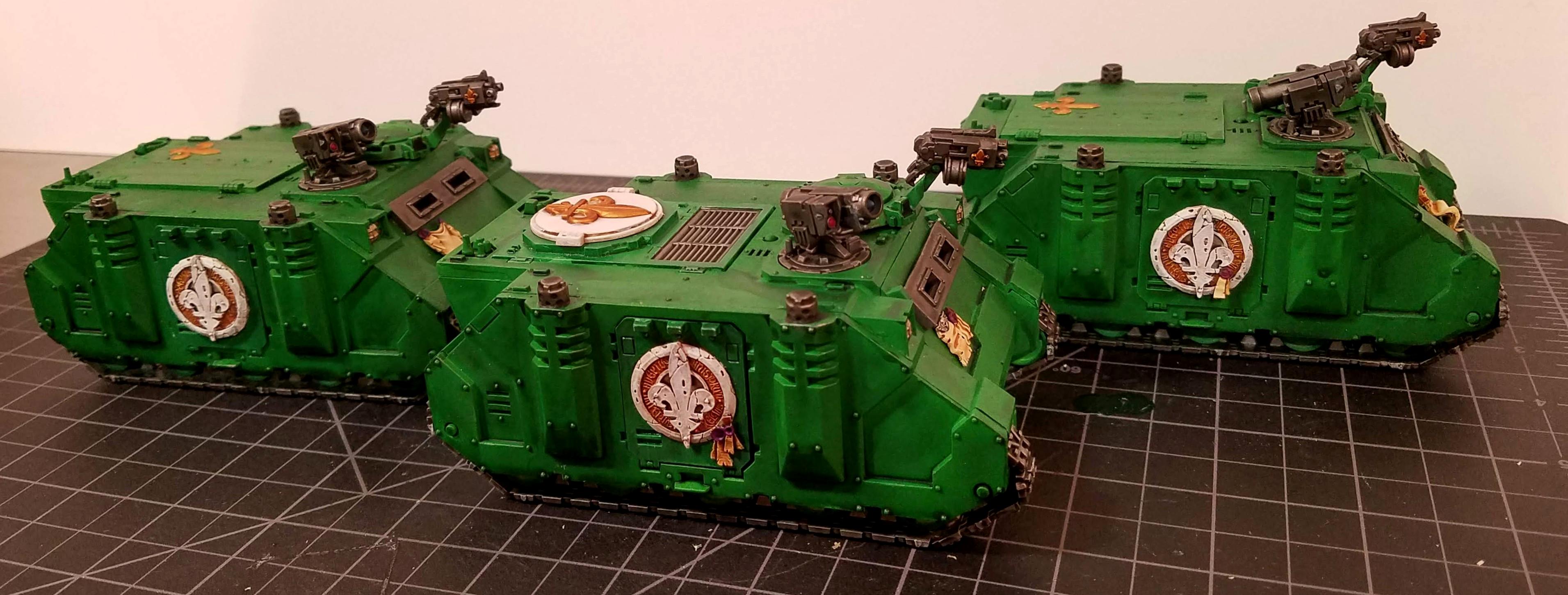 Three Adeptas Sororitas Rhinos, right