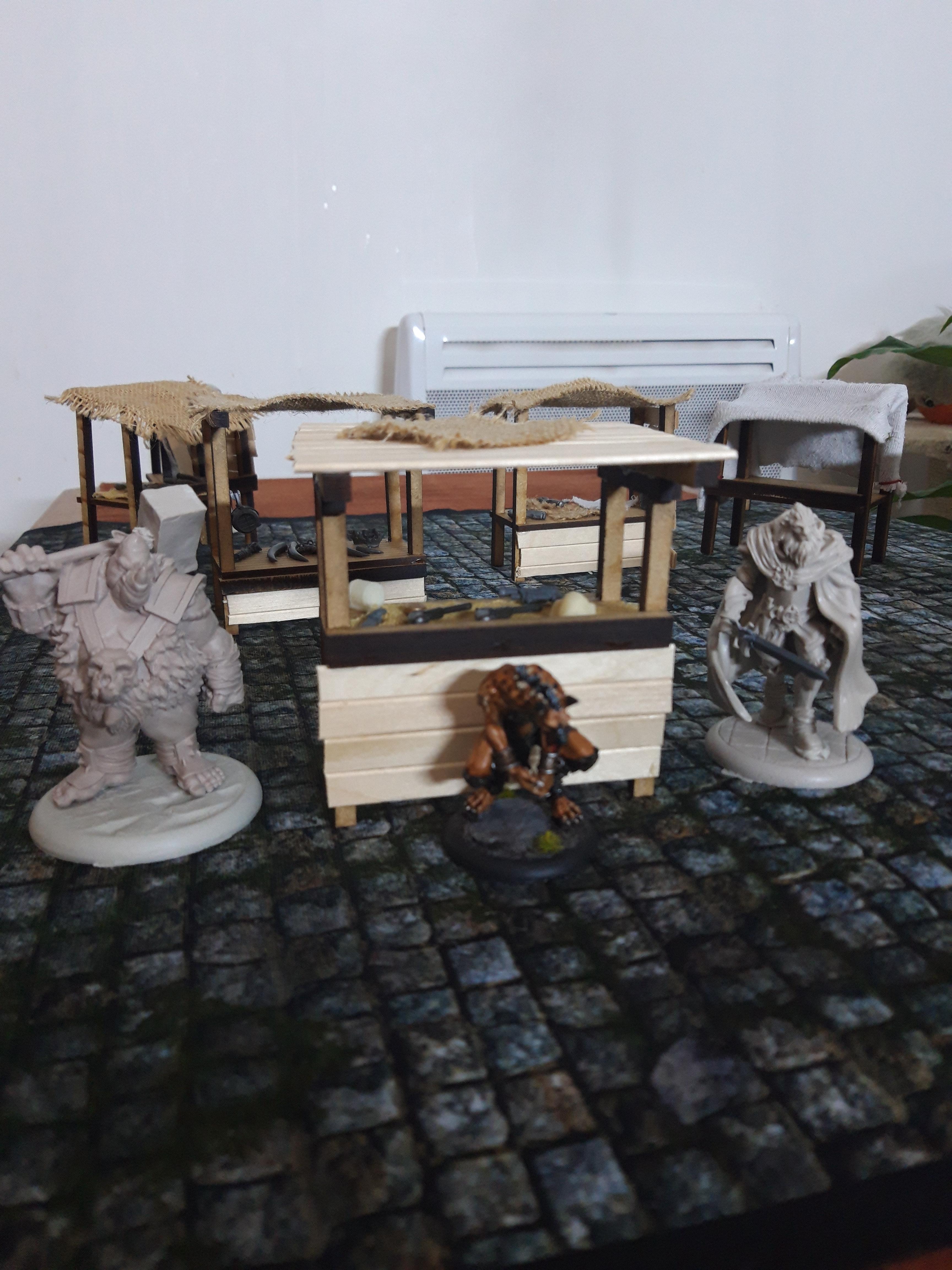 A wooden stall with a Kherops on the left, a minion fang and Matthys from the Black guild on the right