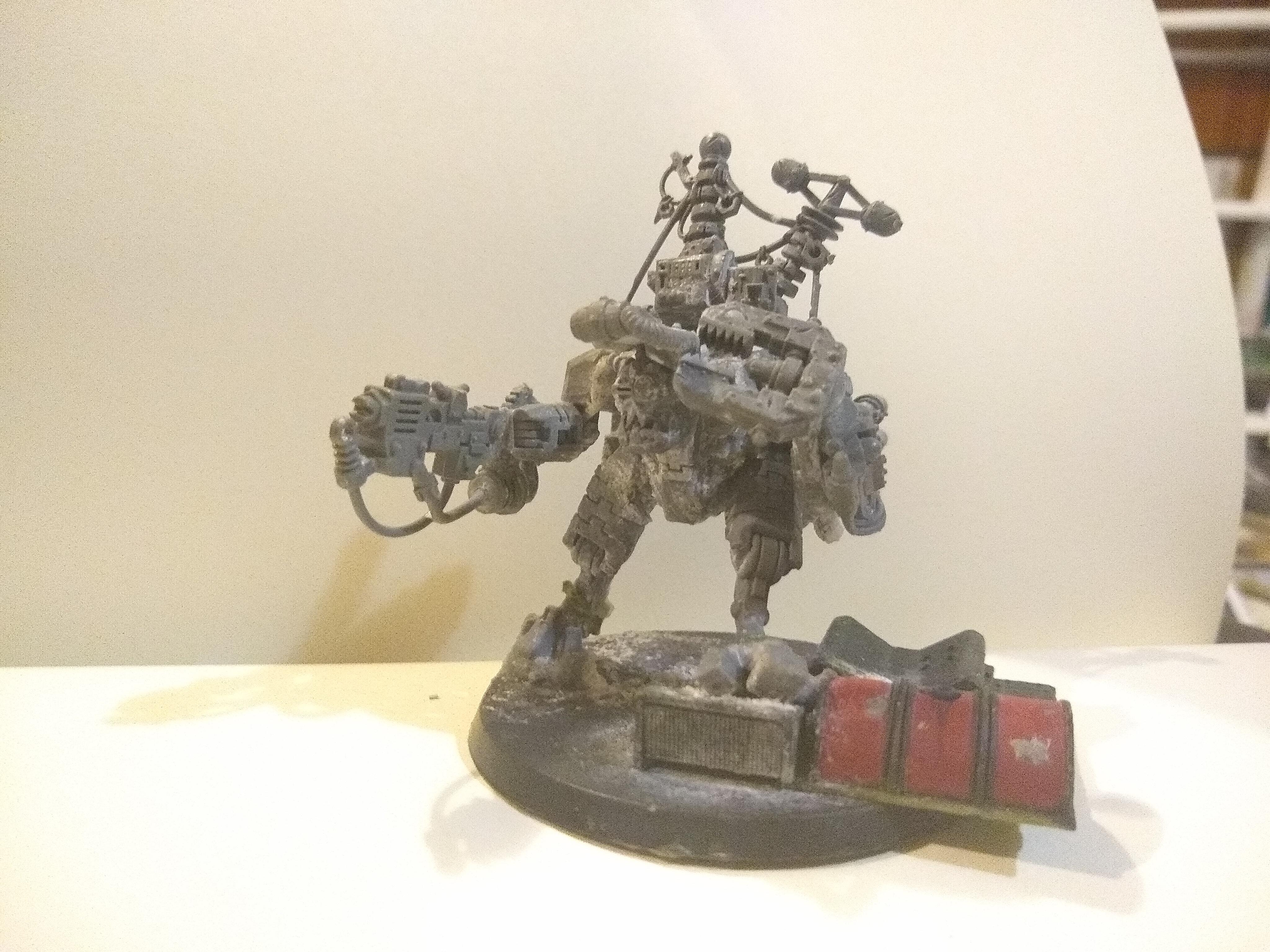 Big mek in mega armor. He looted a tau battlesuit, for that armor