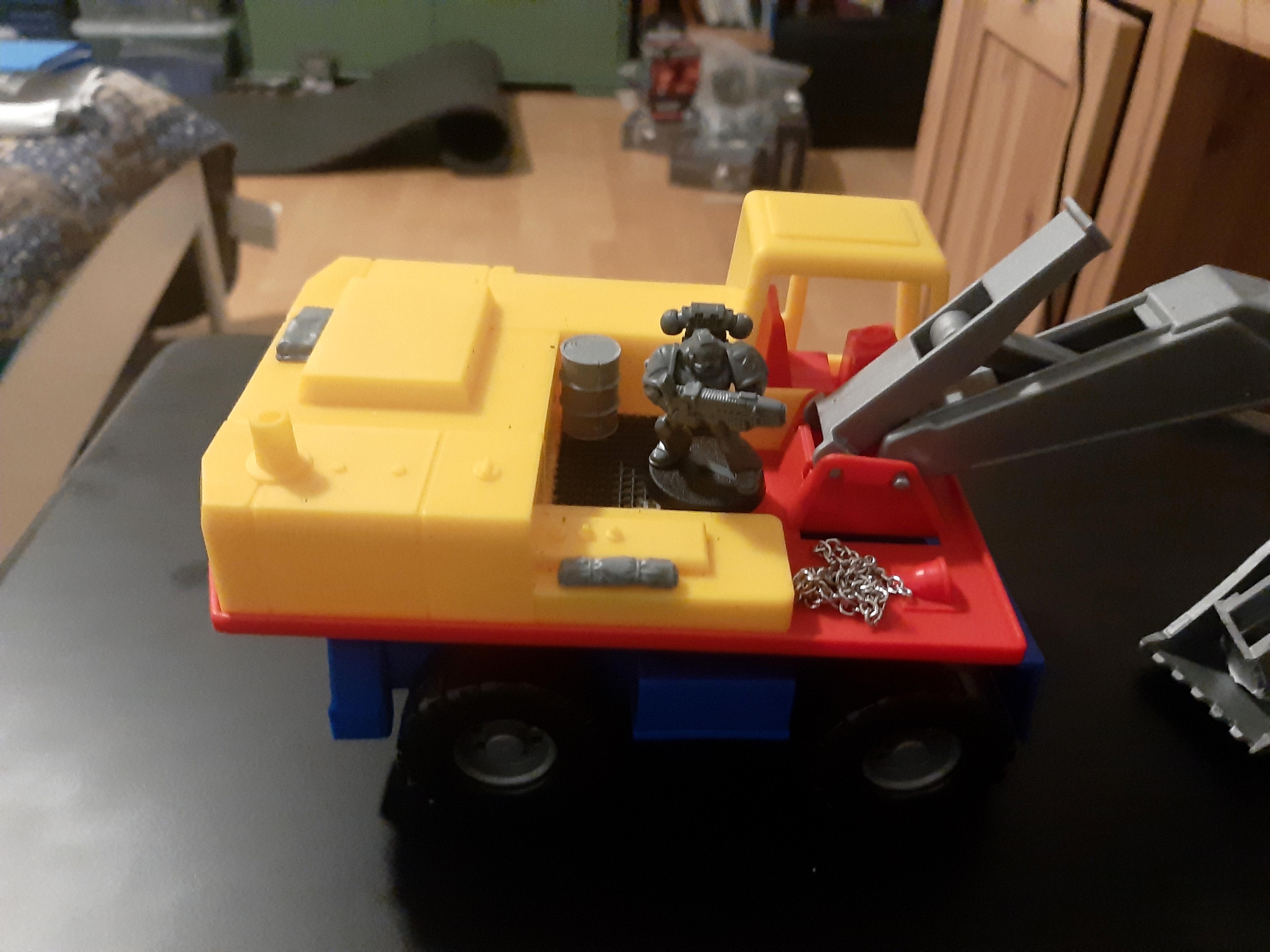 With added bits and space marine for scale