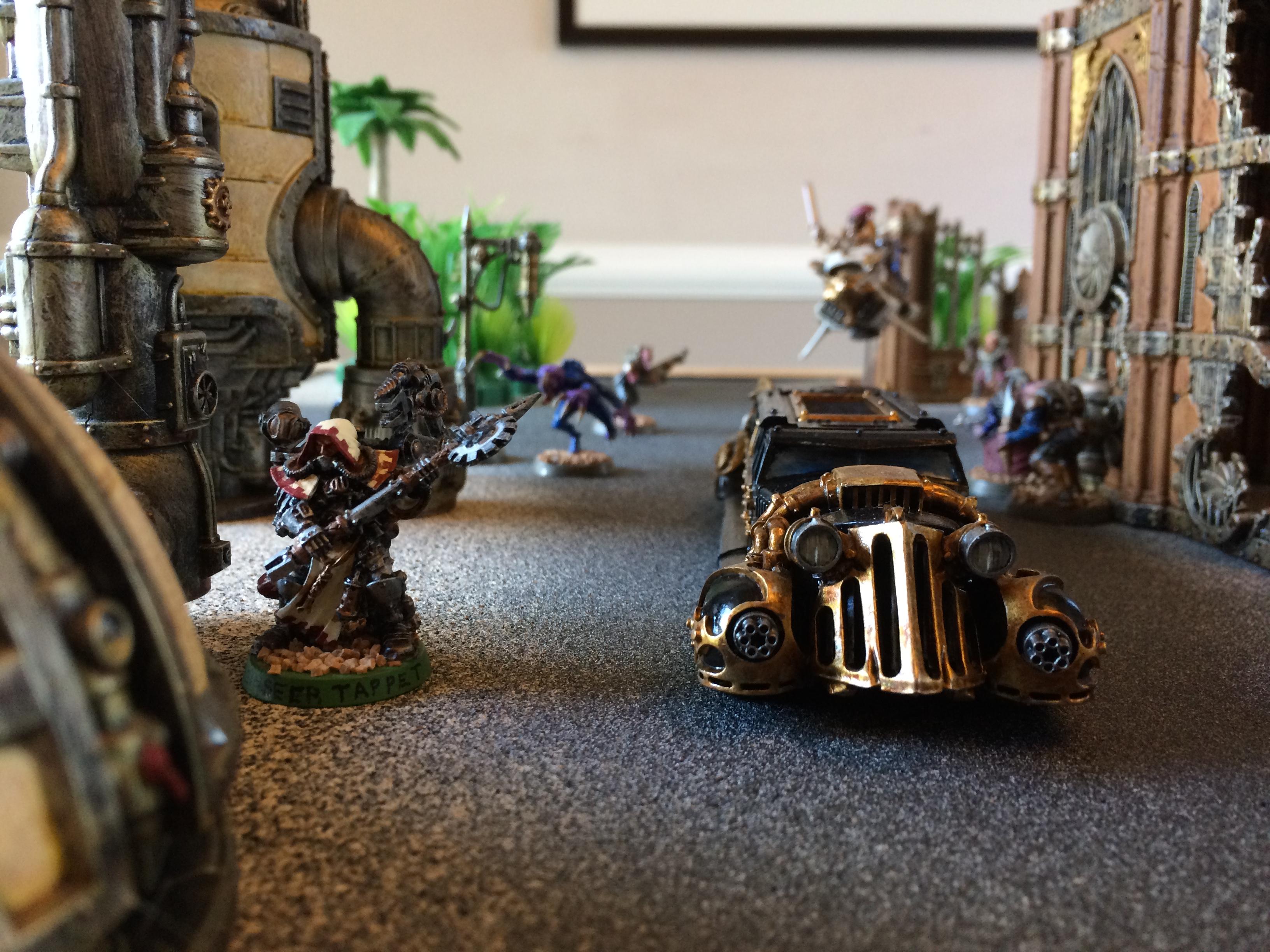 Enginseer Tappet destroys the limo with his servo-arm