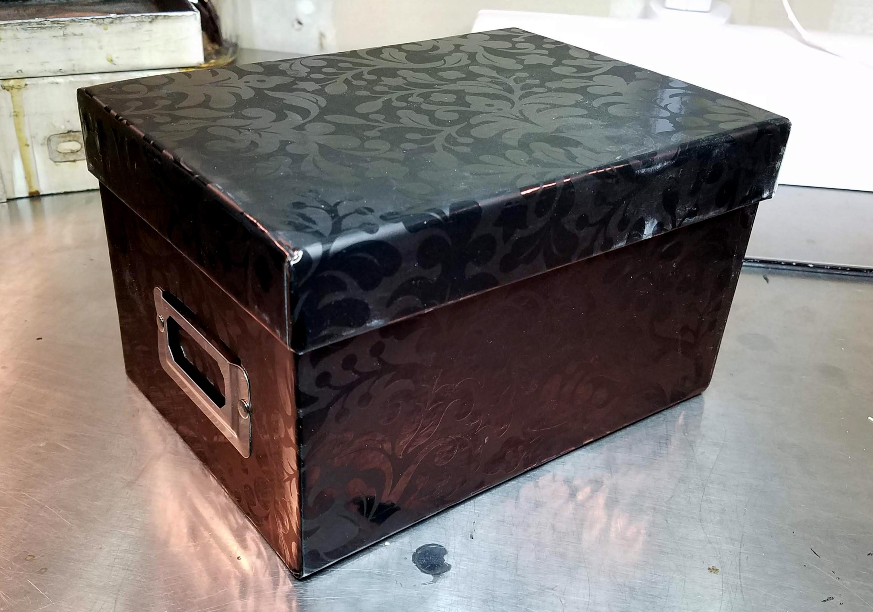 Photo storage box should yield two buildings