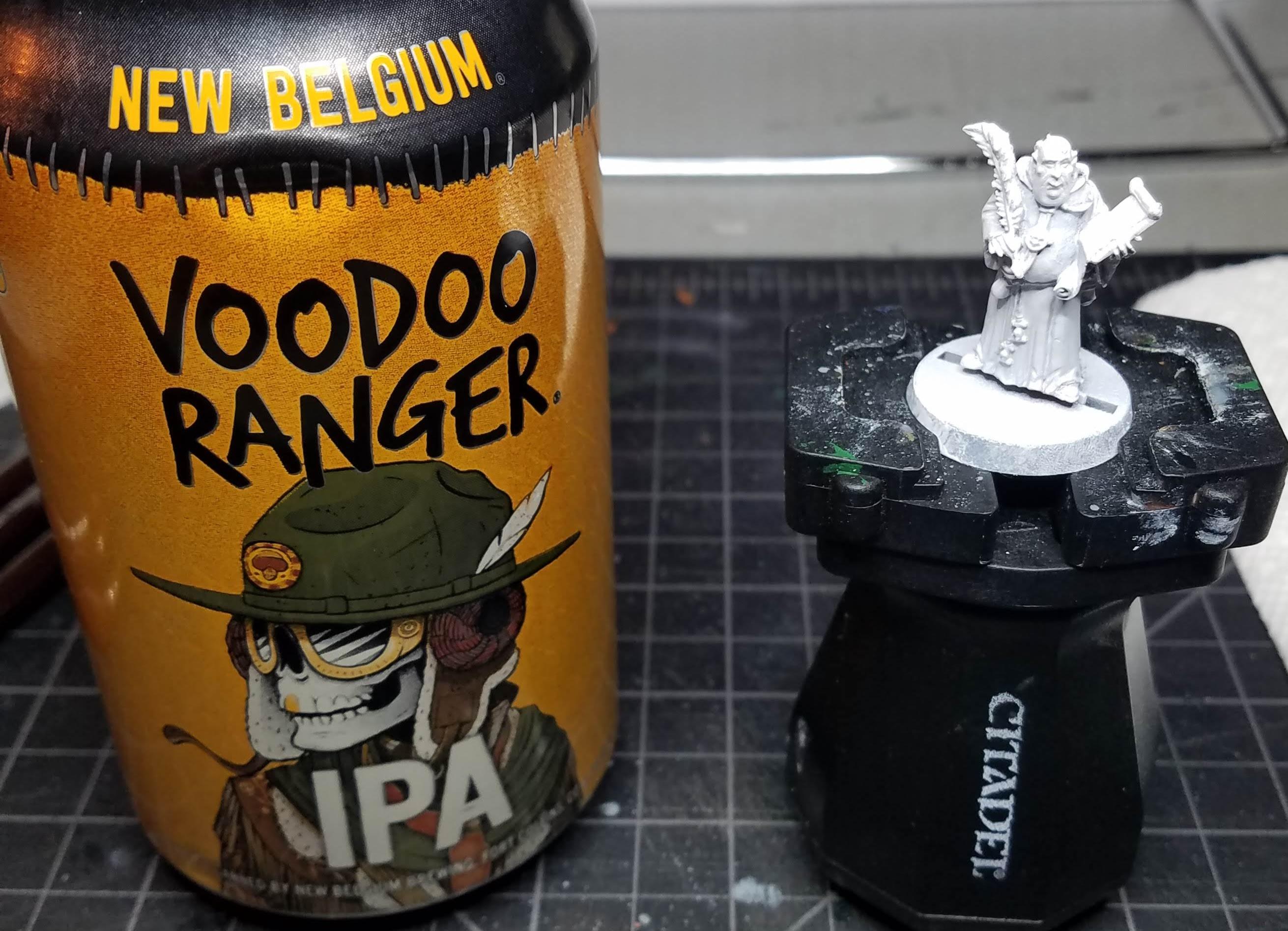An unpainted mini and an IPA