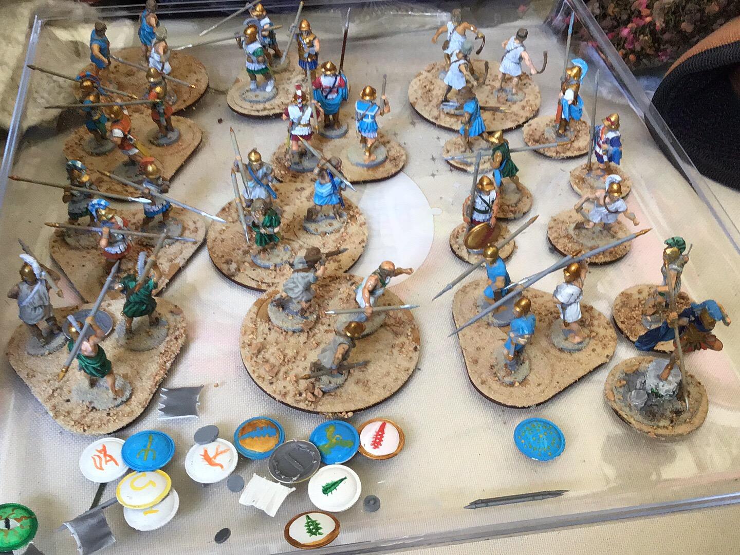 Hand painting Greek shields