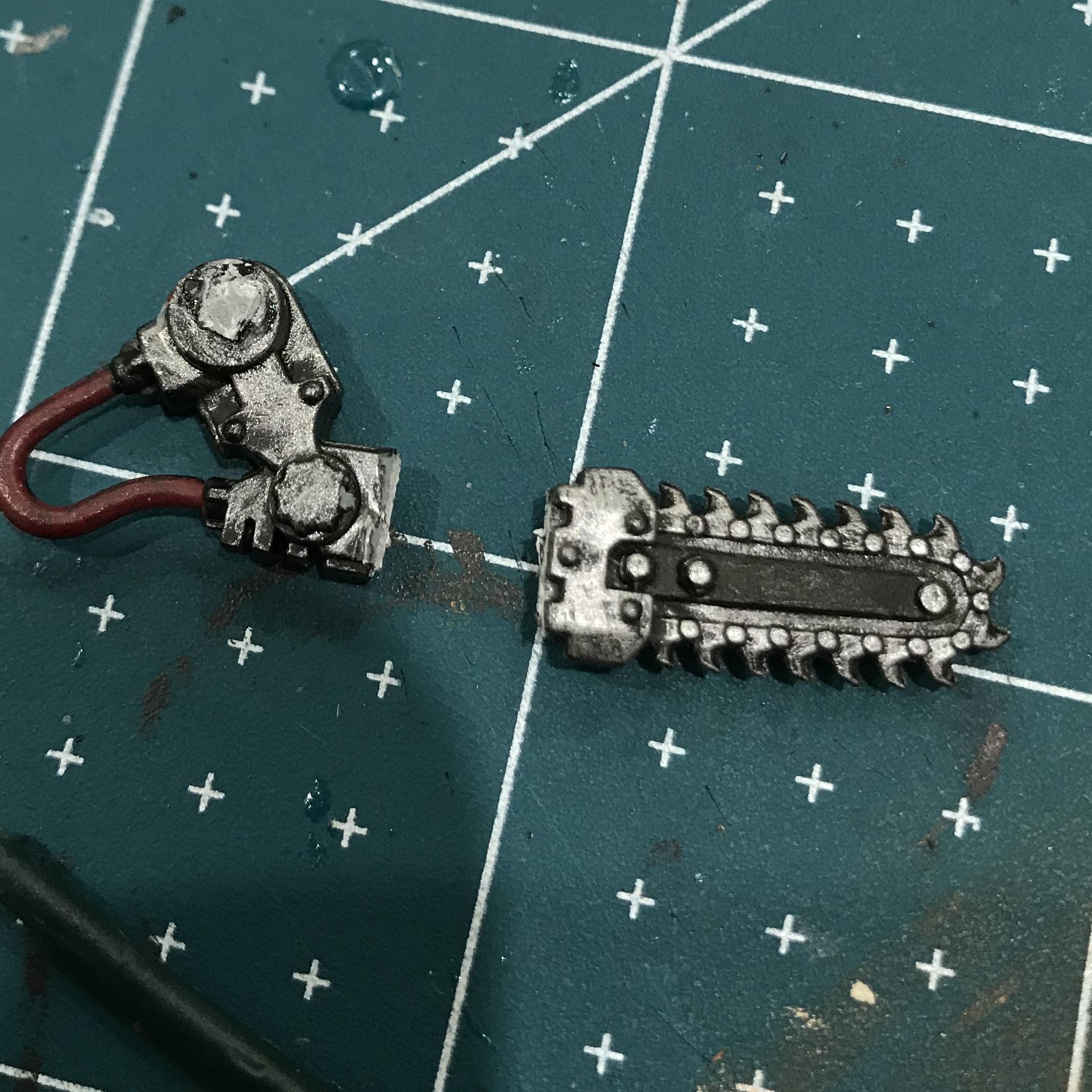 Kitbashed WarpSmith parts for bionic leg