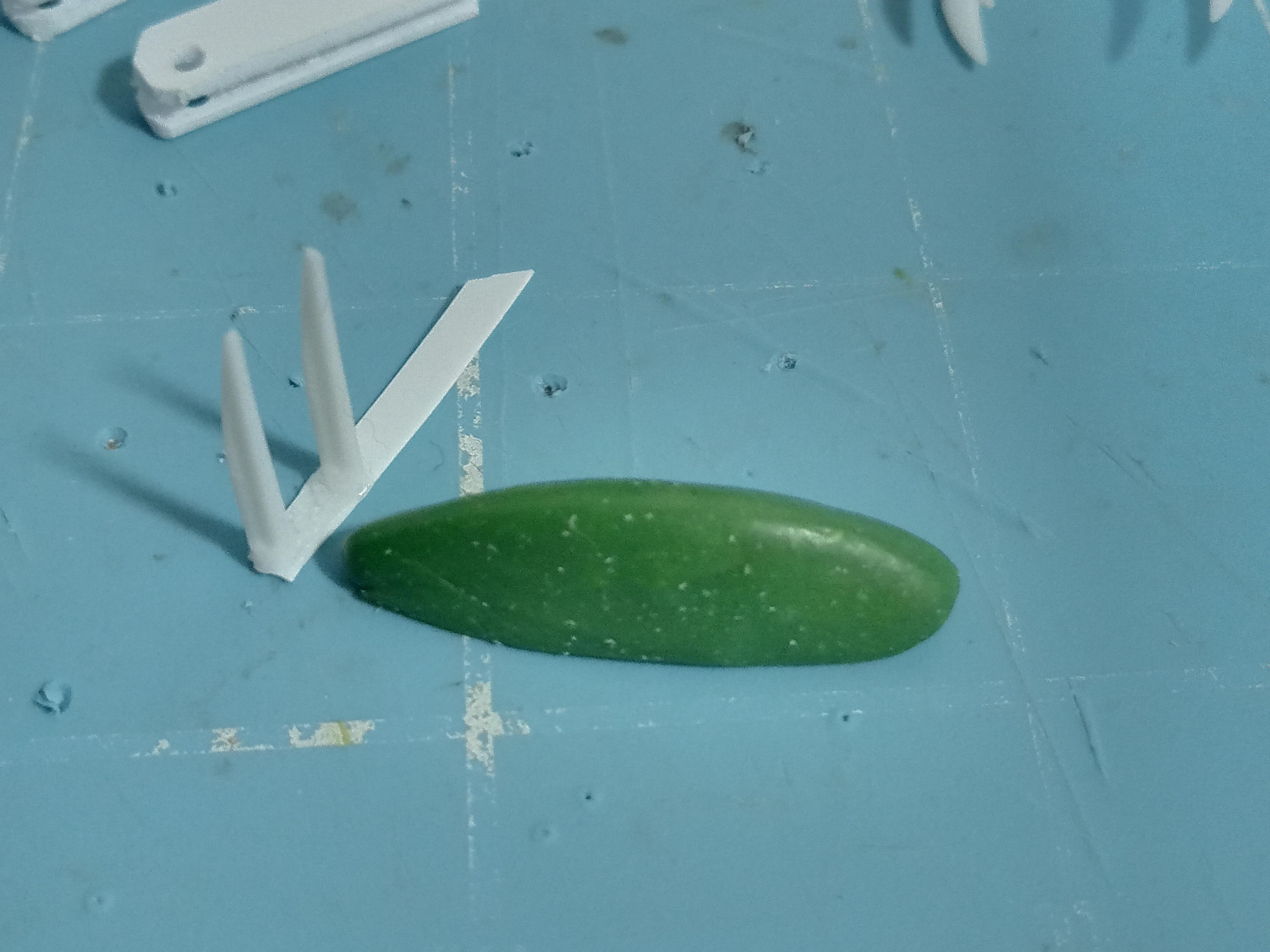 upper head piece deliberately smoothed like a xenomorph with sabre teeth to be added as well as another layer of green stuff 