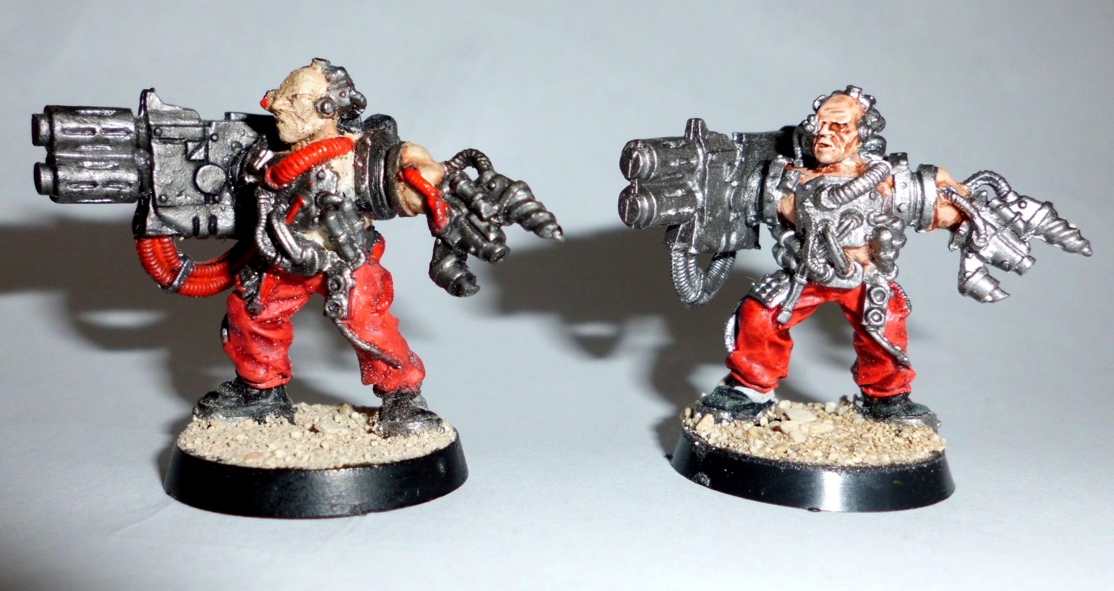 servitors with paint on
