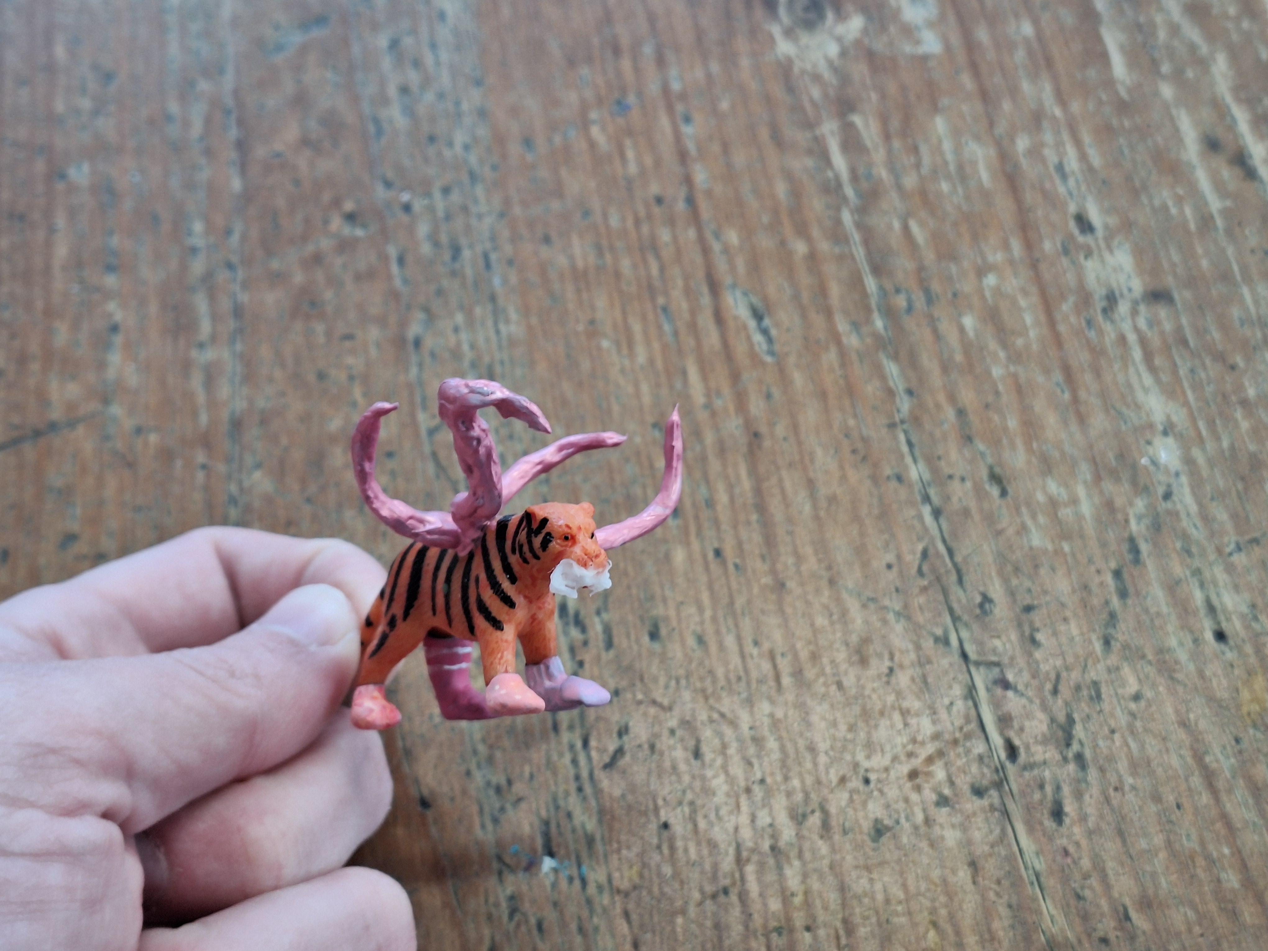 Rabid tiger with pink socks and tentacles