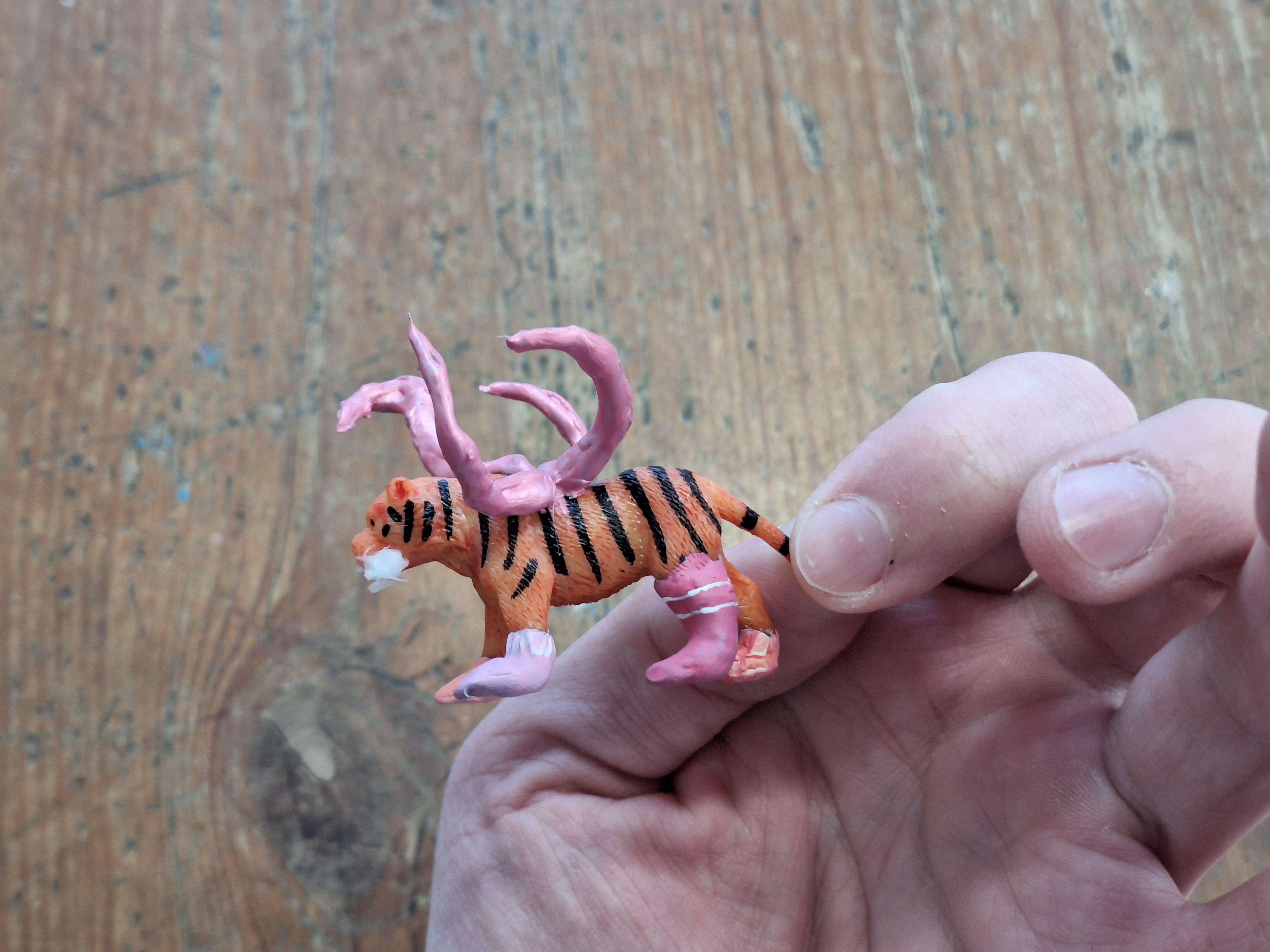 Rabid tiger with pink socks and tentacles