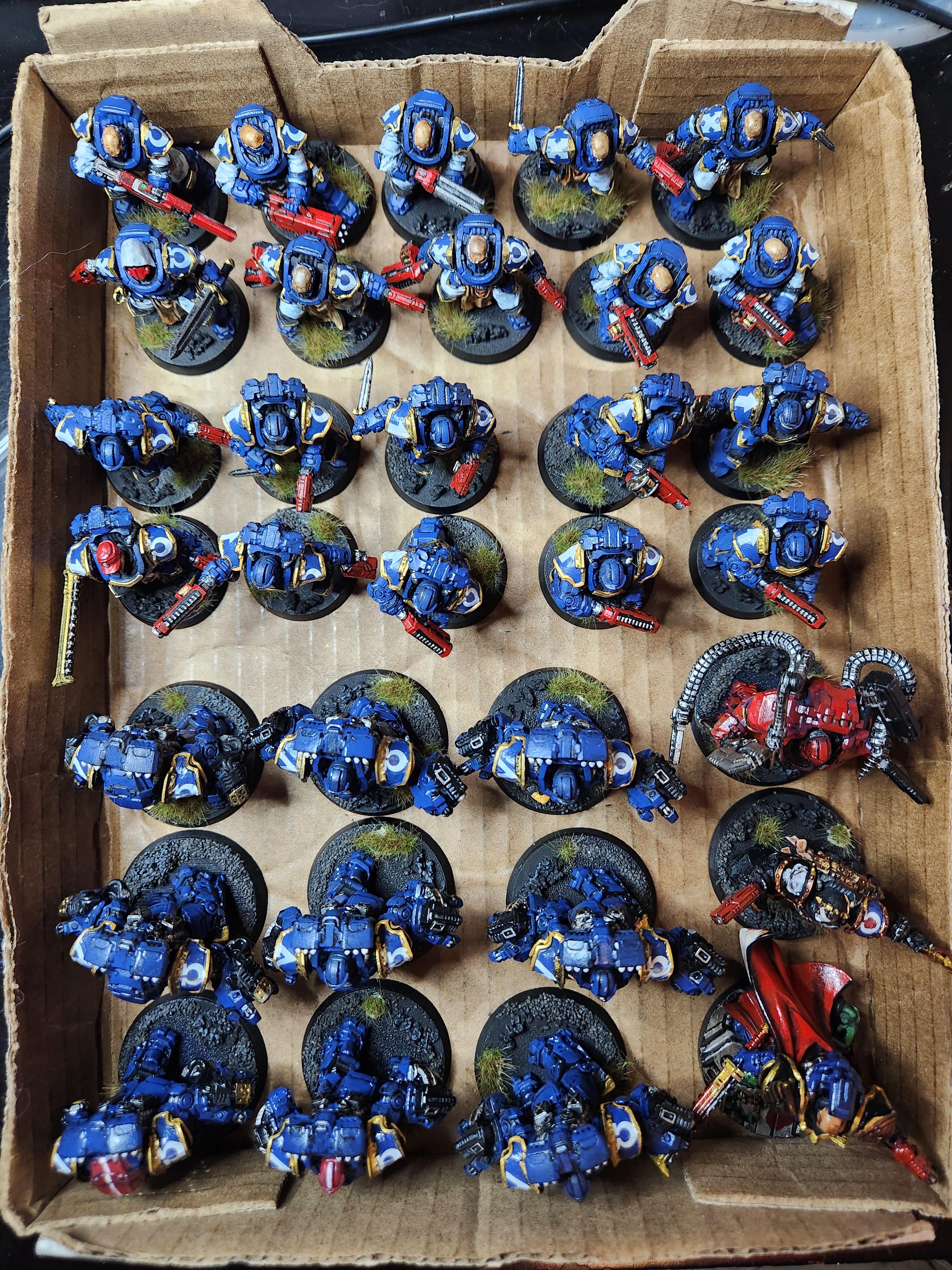 Ultramarines army after gluing ballast and Gamer Grass