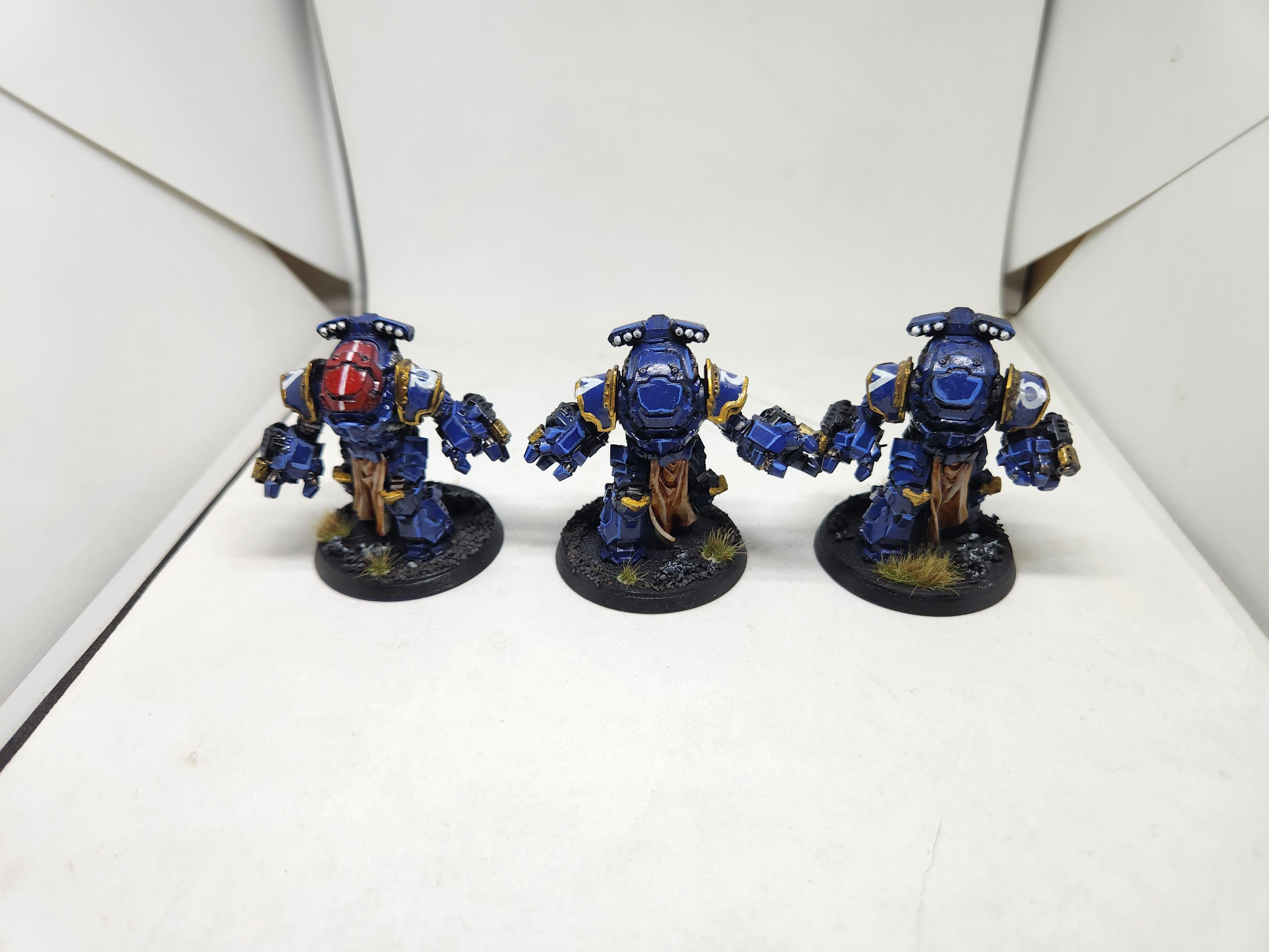 Ultramarines Aggressors with Flamestorm Gauntlets, after highlighting