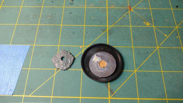 You see where I glued it to the washer?