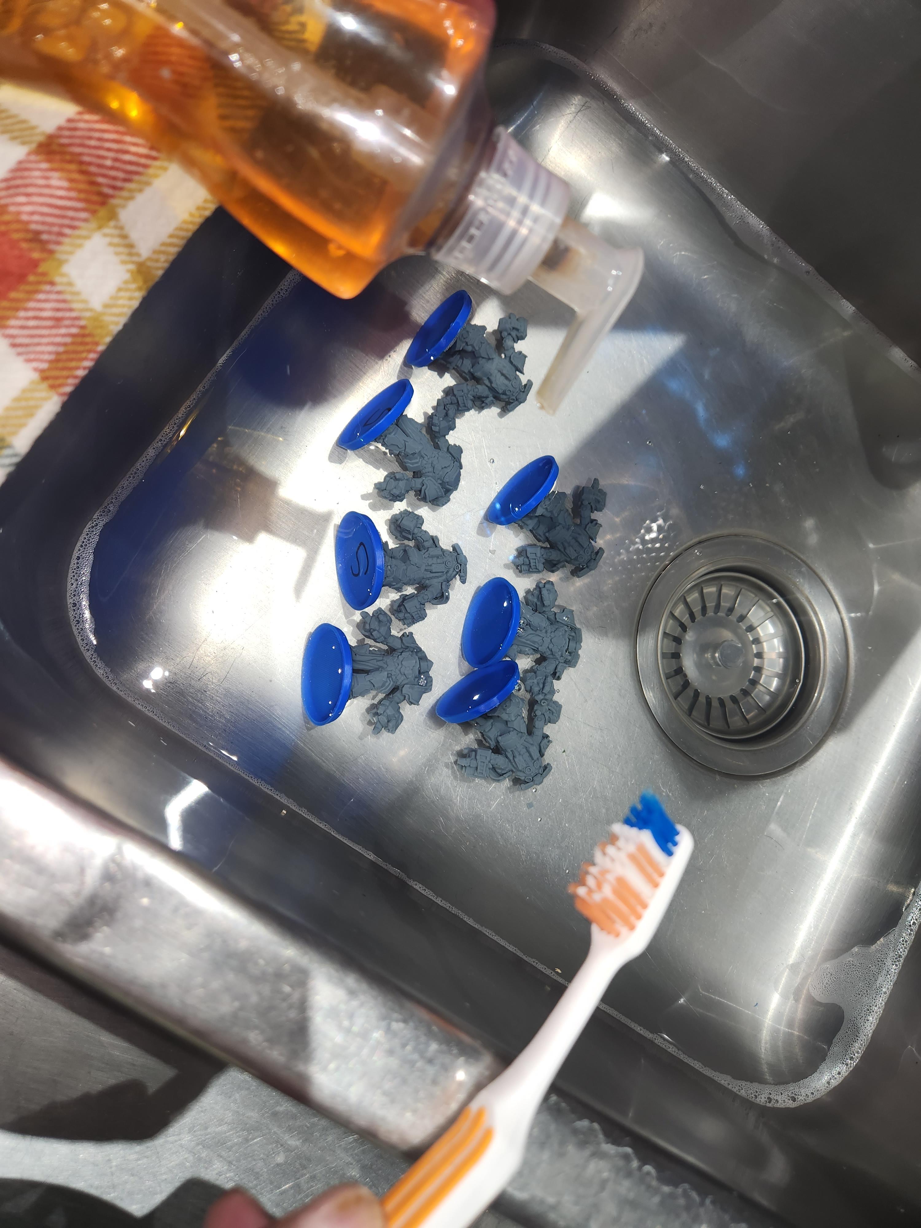 Prep work: washing miniatures with warm water and dish soap