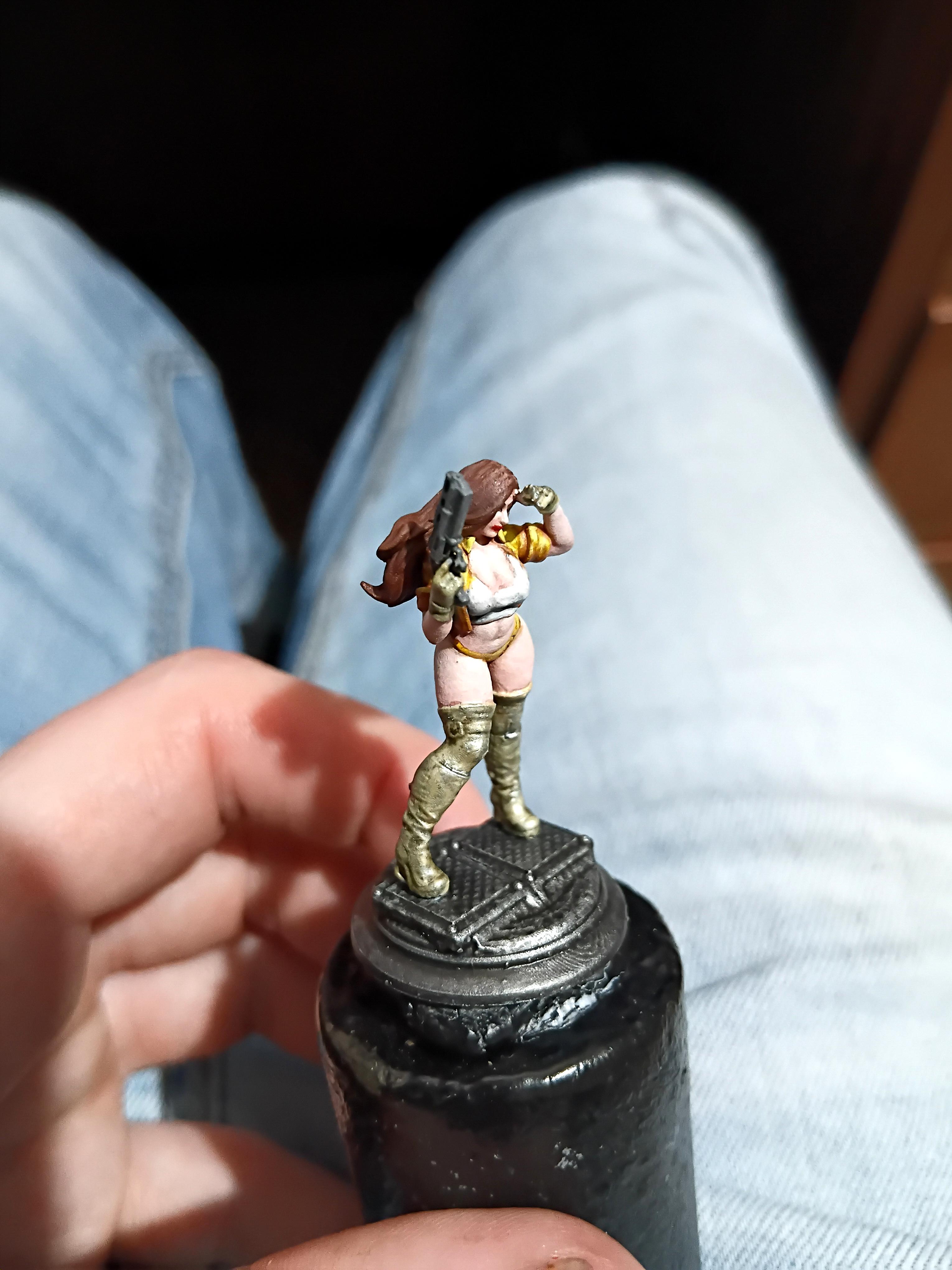 Babe, Brunette, Chick, Chicky Babe, Gold, Gun, Pale, Pinup, Plinth, Pretty, Revolver, Yellow