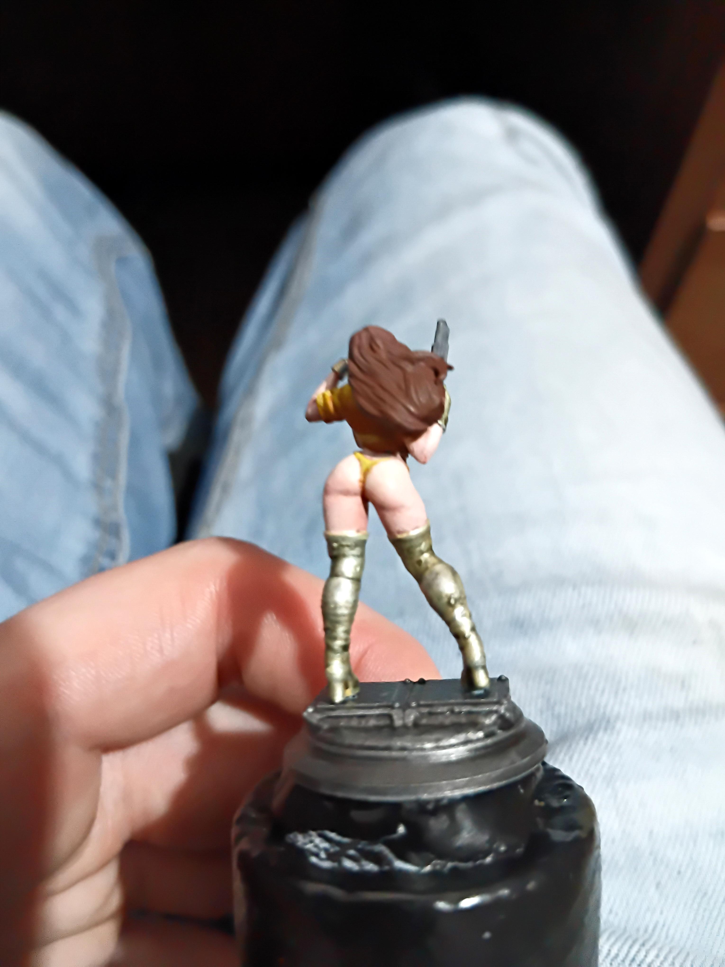 Babe, Brunette, Chick, Chicky Babe, Gold, Gun, Pale, Pinup, Plinth, Pretty, Revolver, Yellow