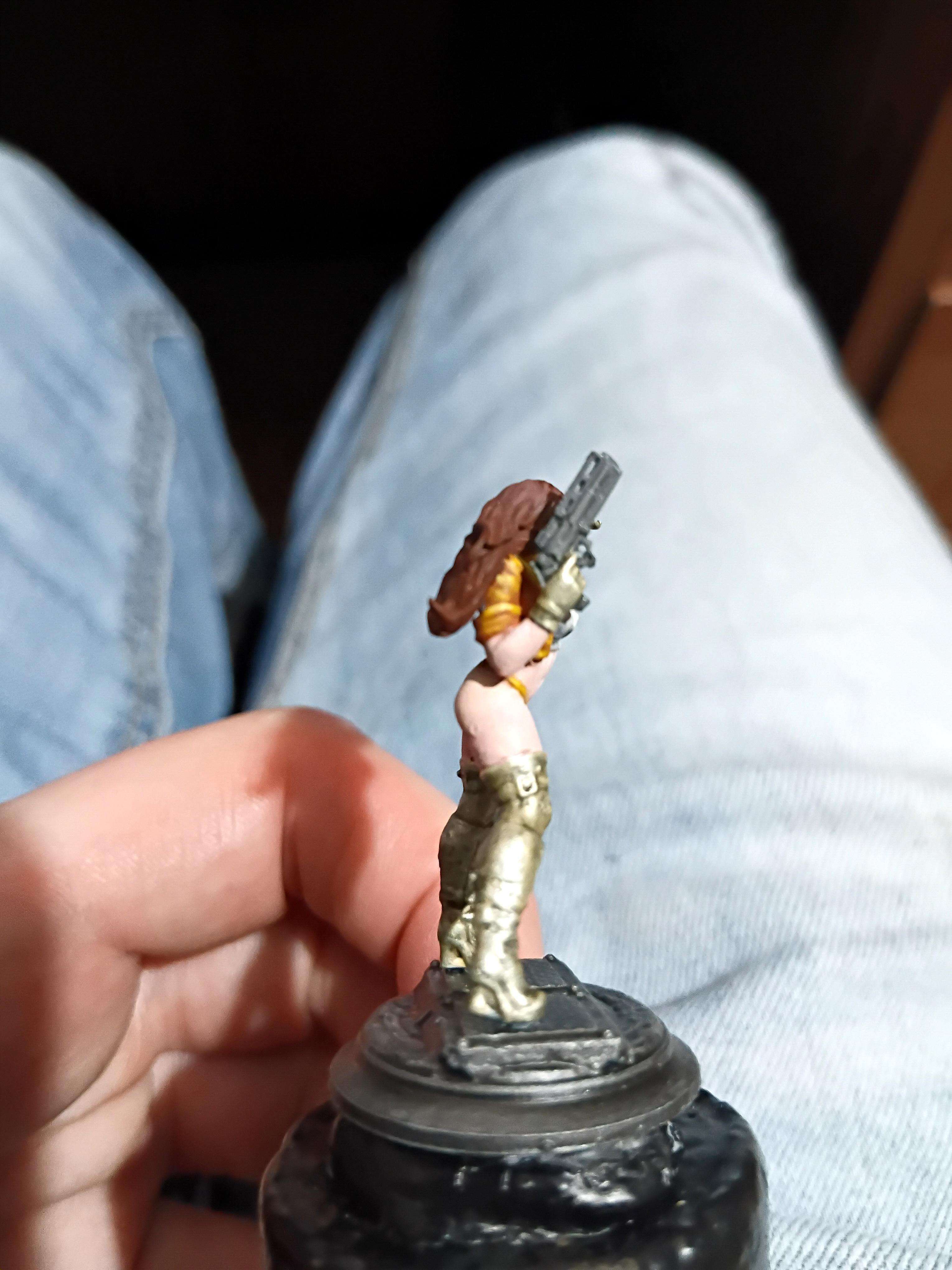 Babe, Brunette, Chick, Chicky Babe, Gold, Gun, Pale, Pinup, Plinth, Pretty, Revolver, Yellow