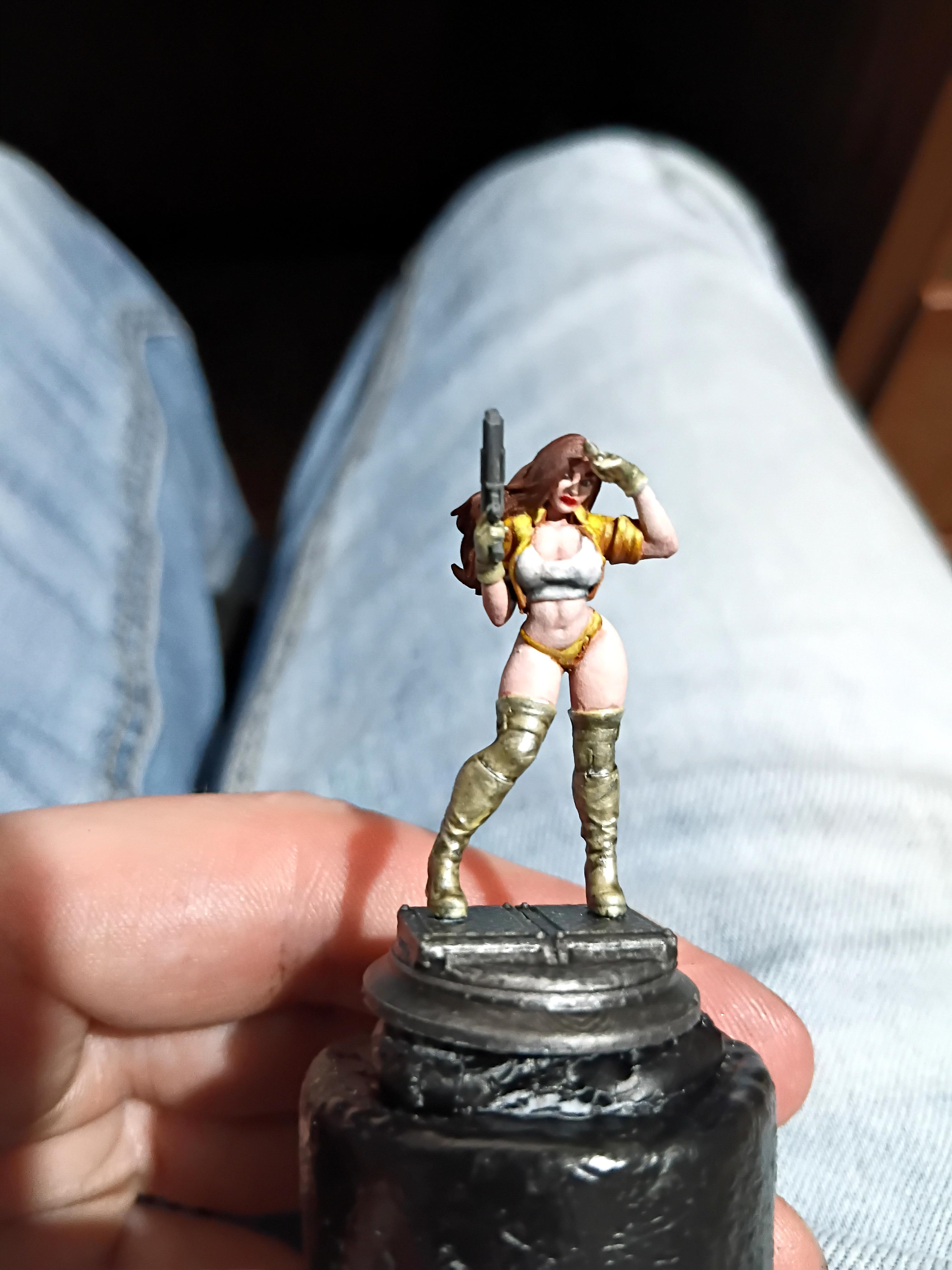 Babe, Brunette, Chick, Chicky Babe, Gold, Gun, Pale, Pinup, Plinth, Pretty, Revolver, Yellow