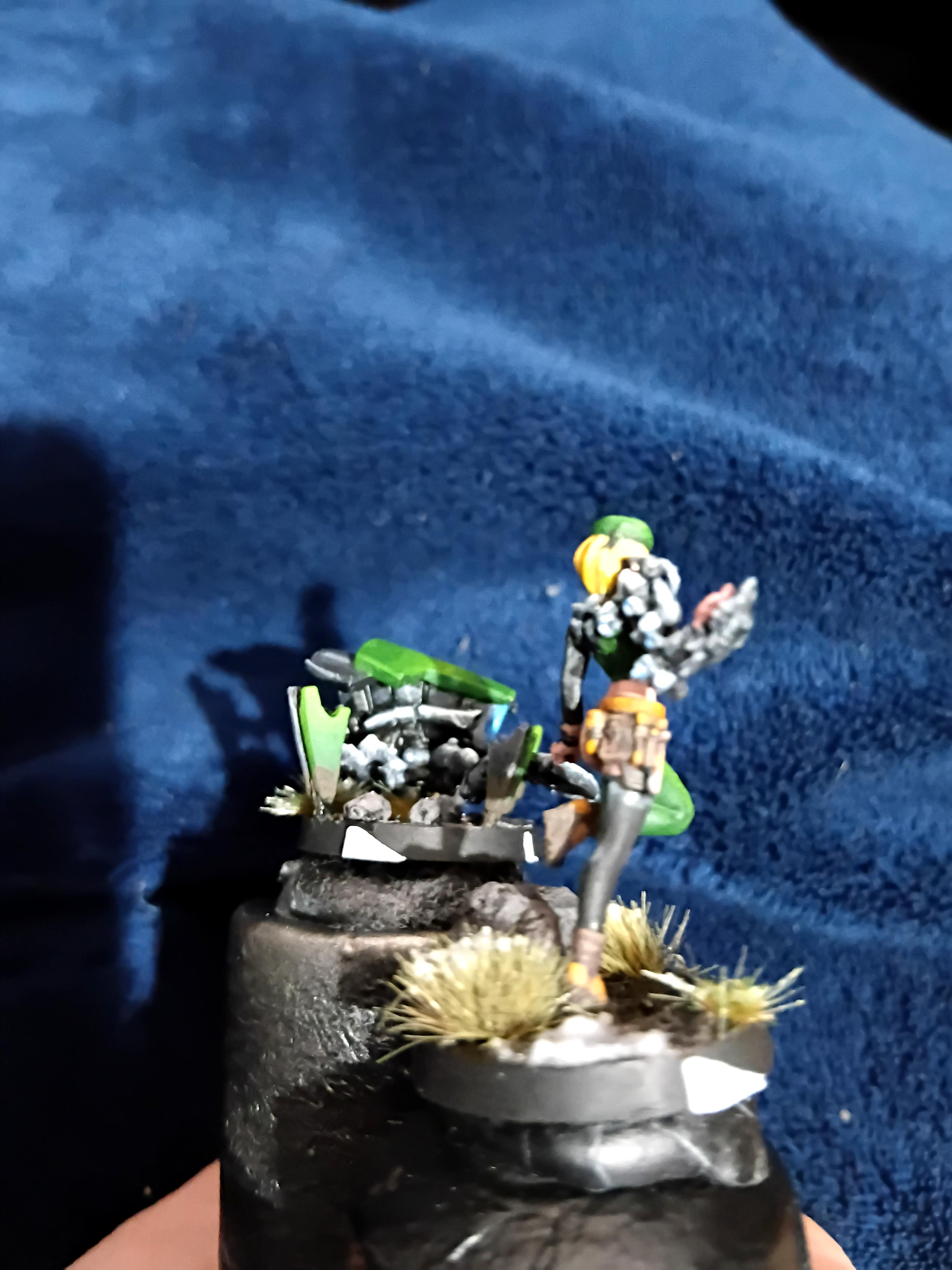 Blonde, Cute, Engineer, Girl, Green And Black, Infinity, Miniature, Non-Metallic Metal, Not Metallic Metal, Pano, Panoceania, Pinup, Robot, Tech-bee