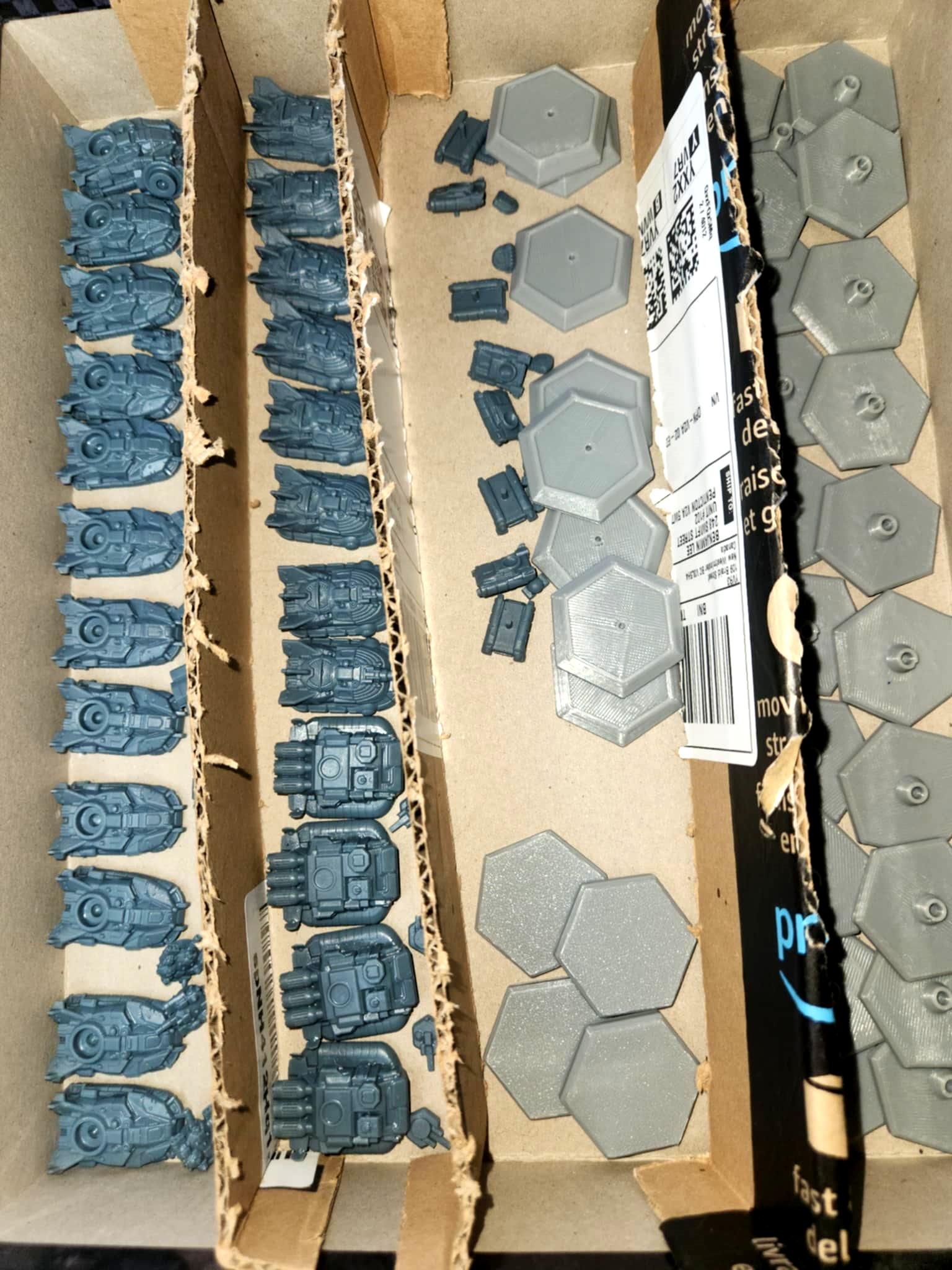 3d printed Hover Tanks, lined up after printing
